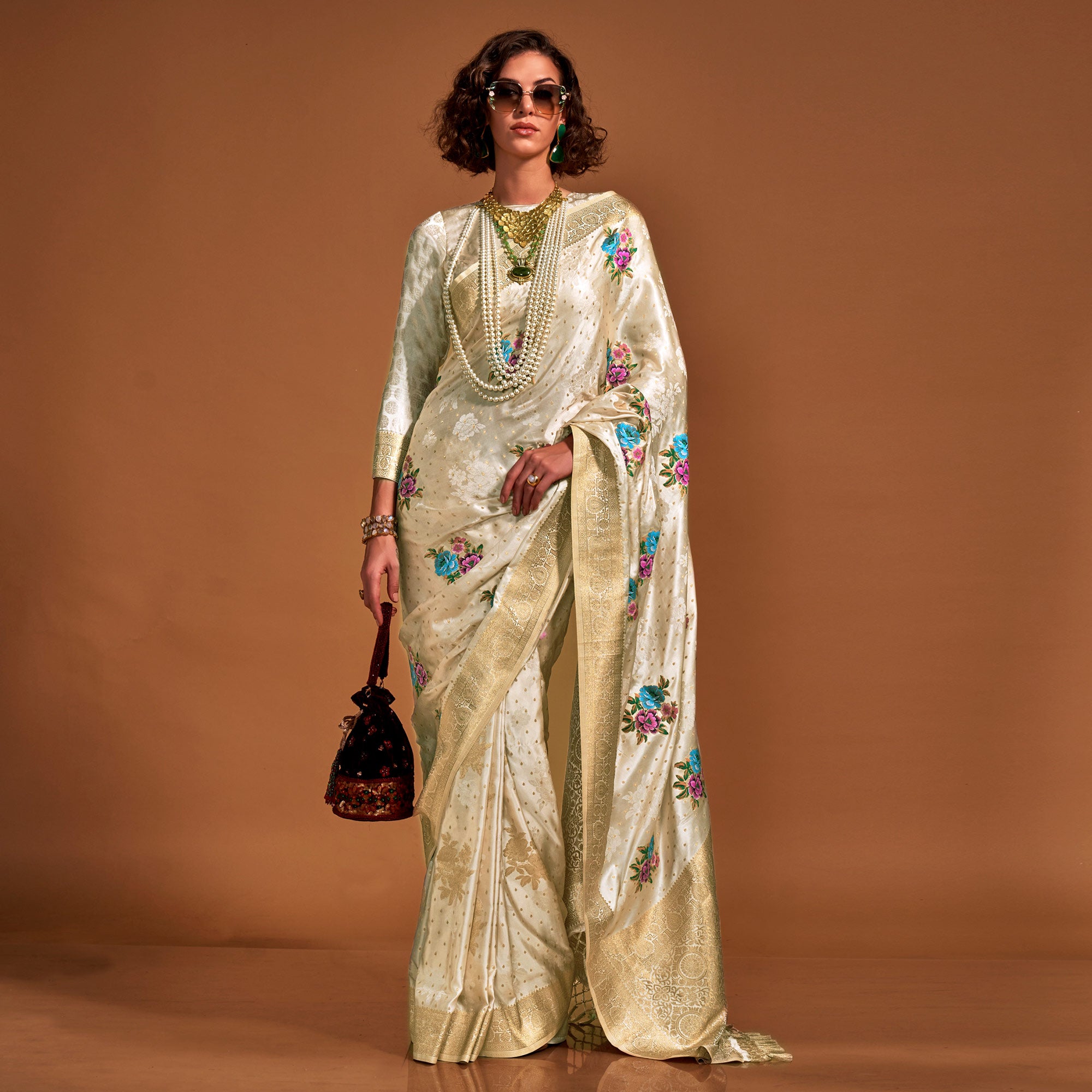 Off White Floral Woven Satin Saree With Tassels