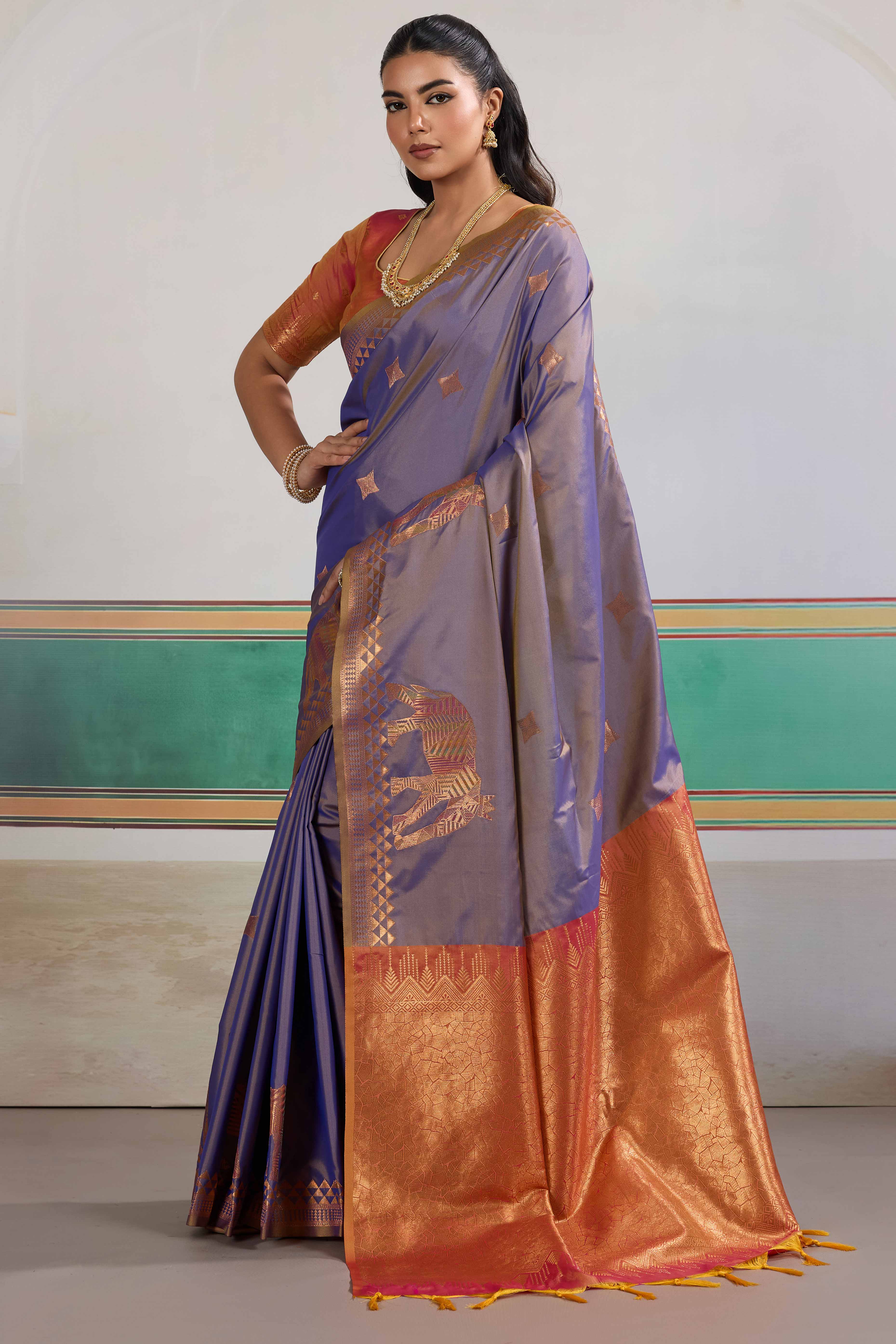 Traditional Lavender Pure Silk Saree Featuring Elephant Motif Zari Weaving & Tassel Pallu