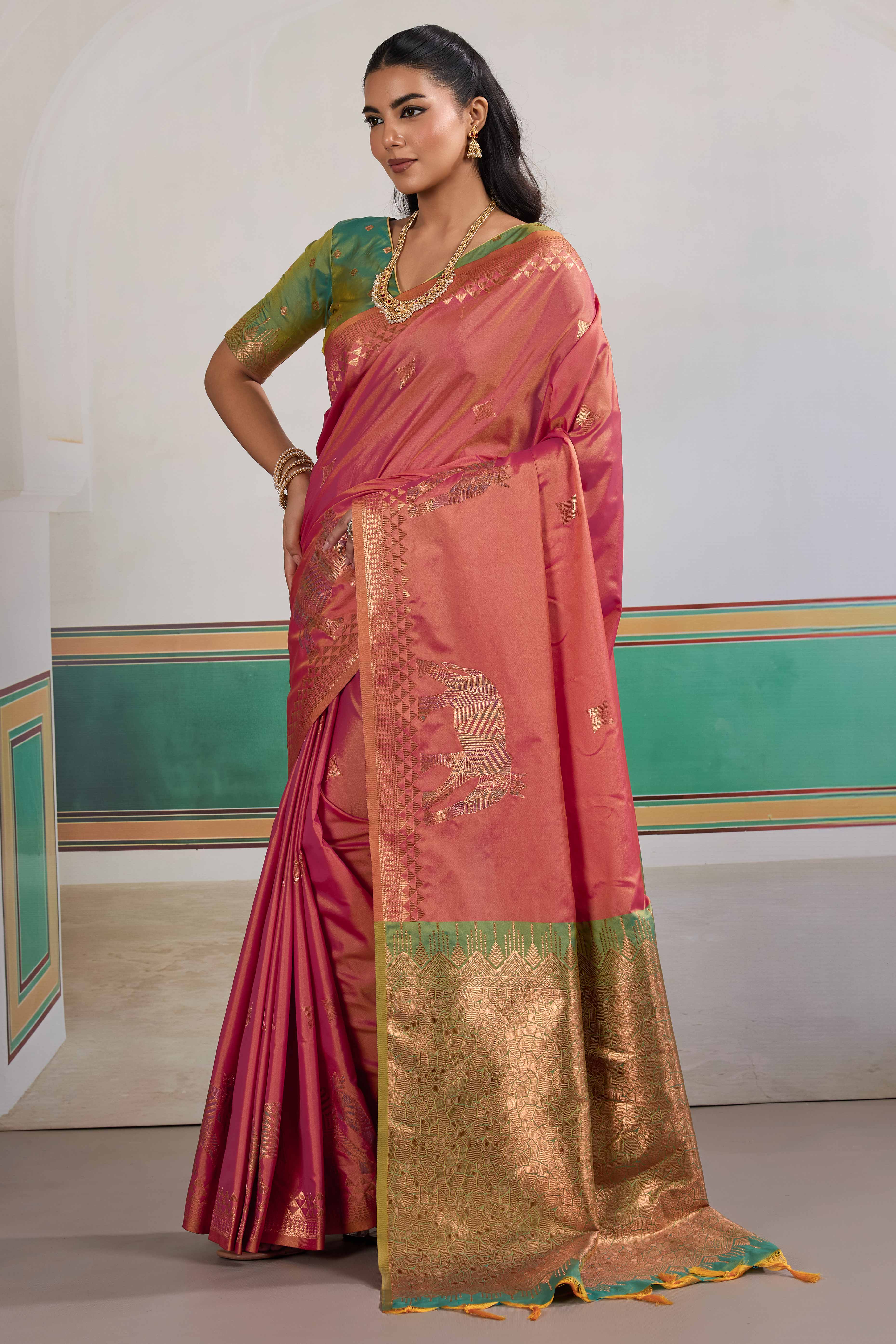 Traditional Rose Pink Pure Silk Saree Featuring Elephant Motif Zari Weaving & Tassel Pallu