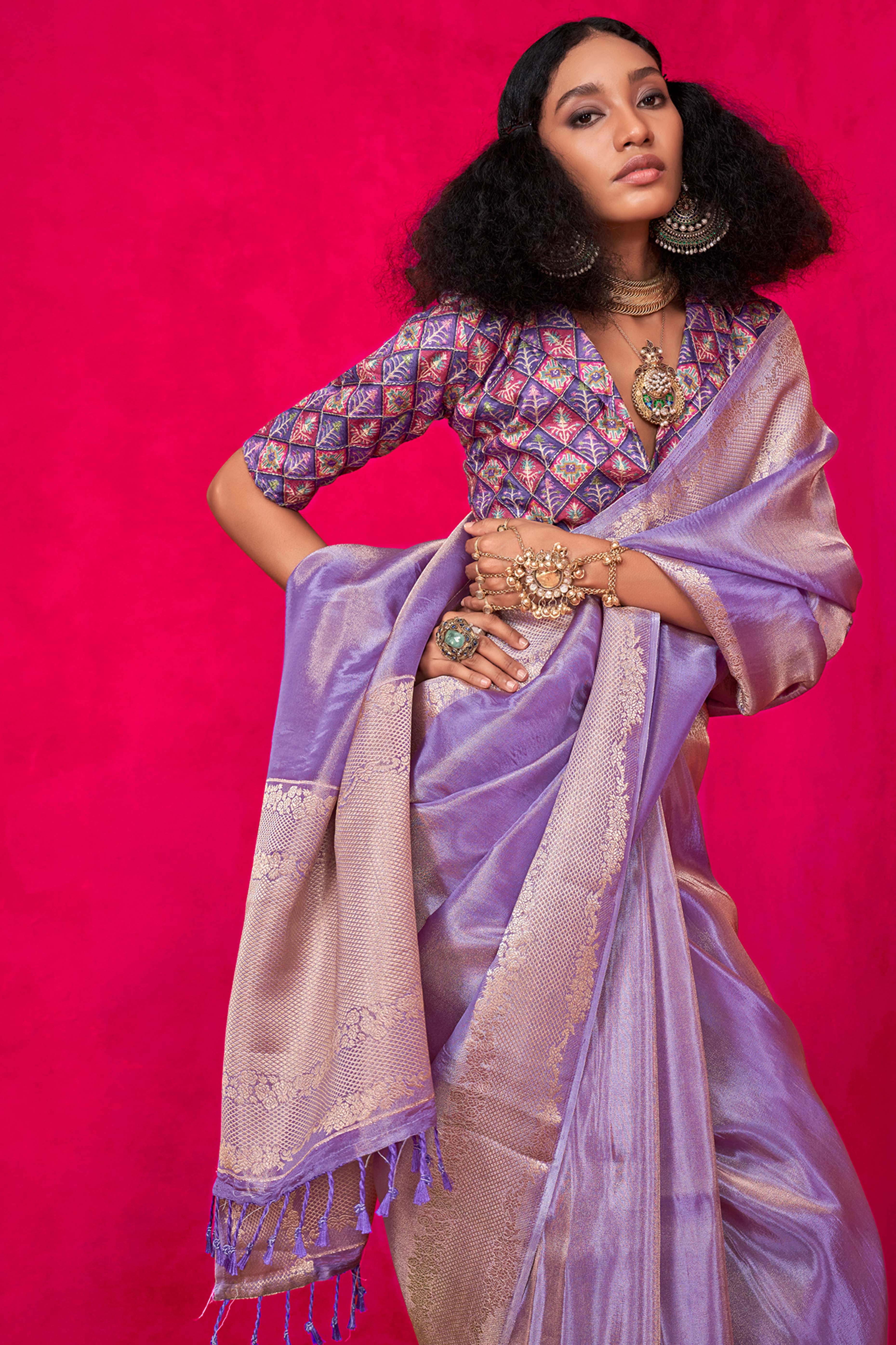 Purple Tissue Saree Adorned with Zari Weaving Border