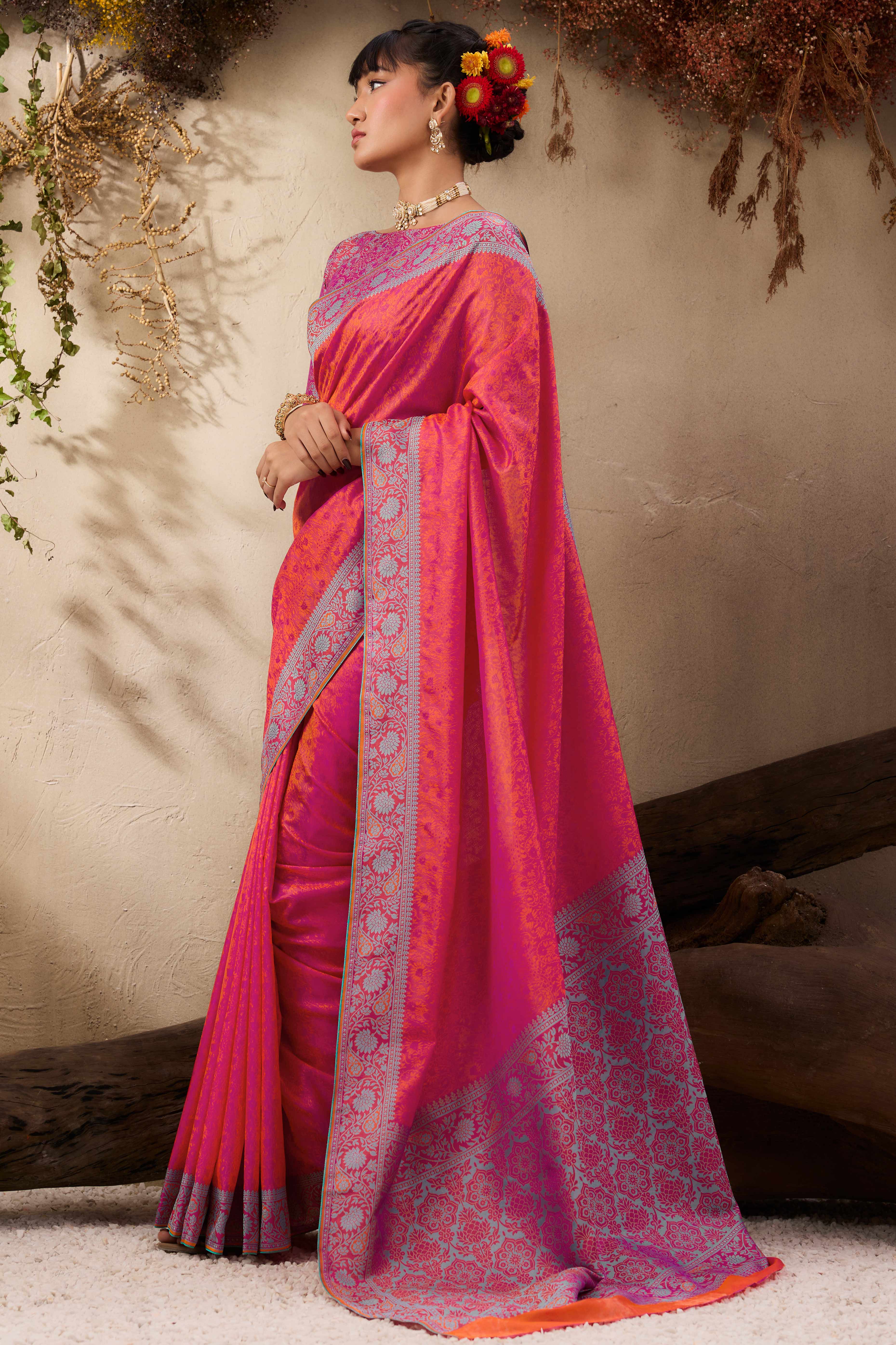 Rani Pink Pure Silk Kanjivaram Handloom Saree Enhanced with Zari Woven Patterns