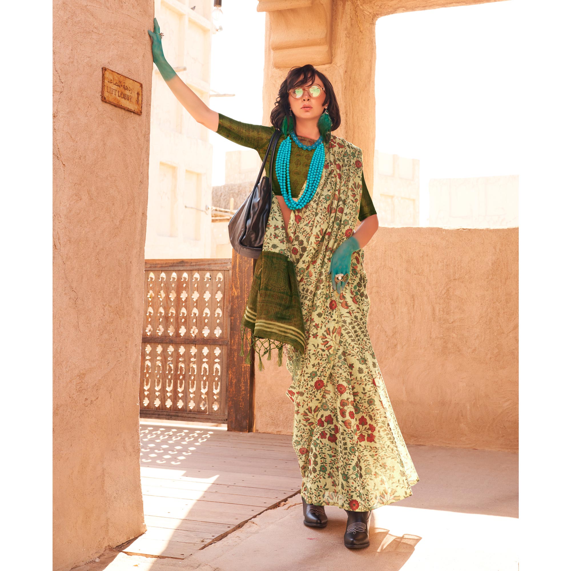 Beige Floral Printed Tissue Saree With Tassels