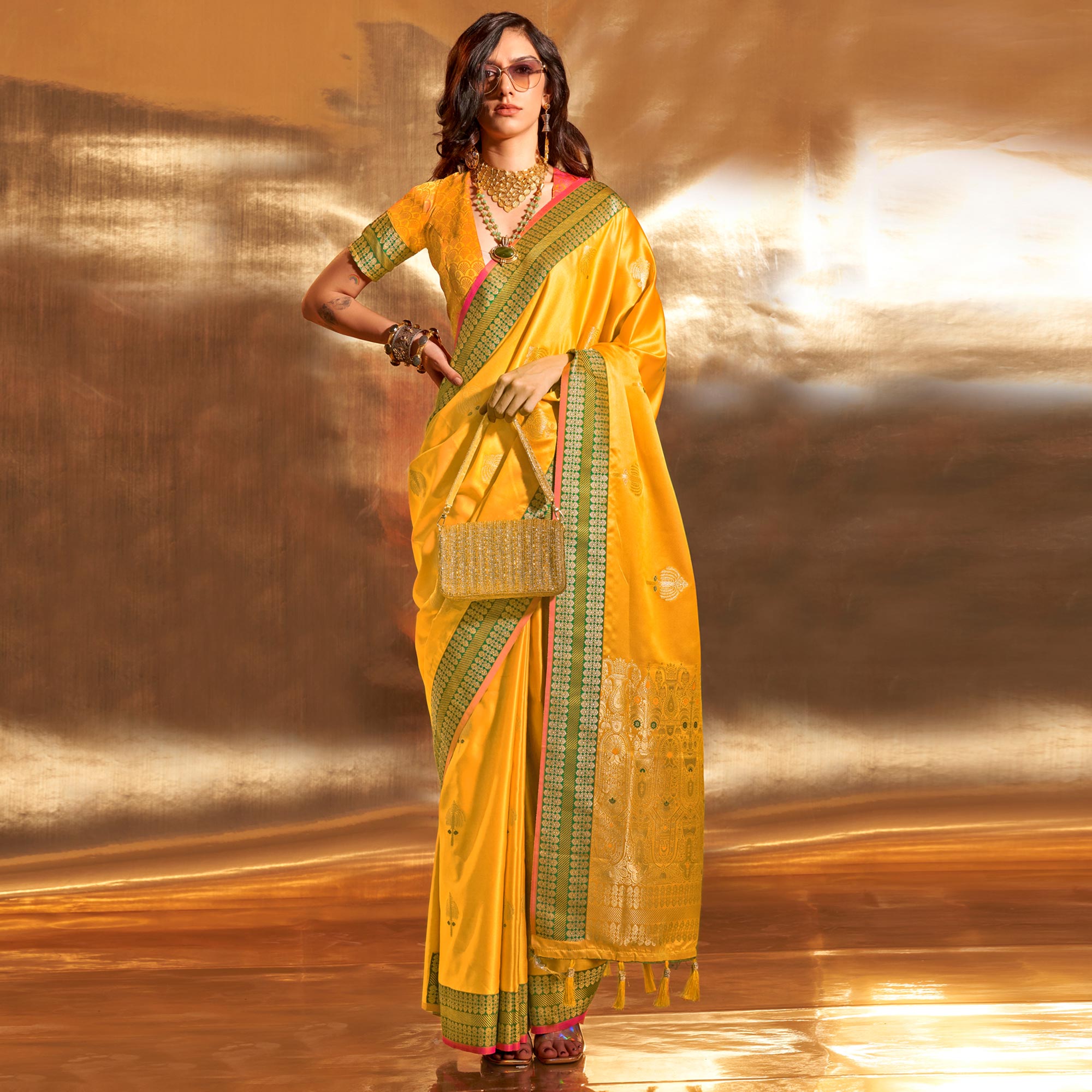 Yellow Woven Satin Saree With Tassels