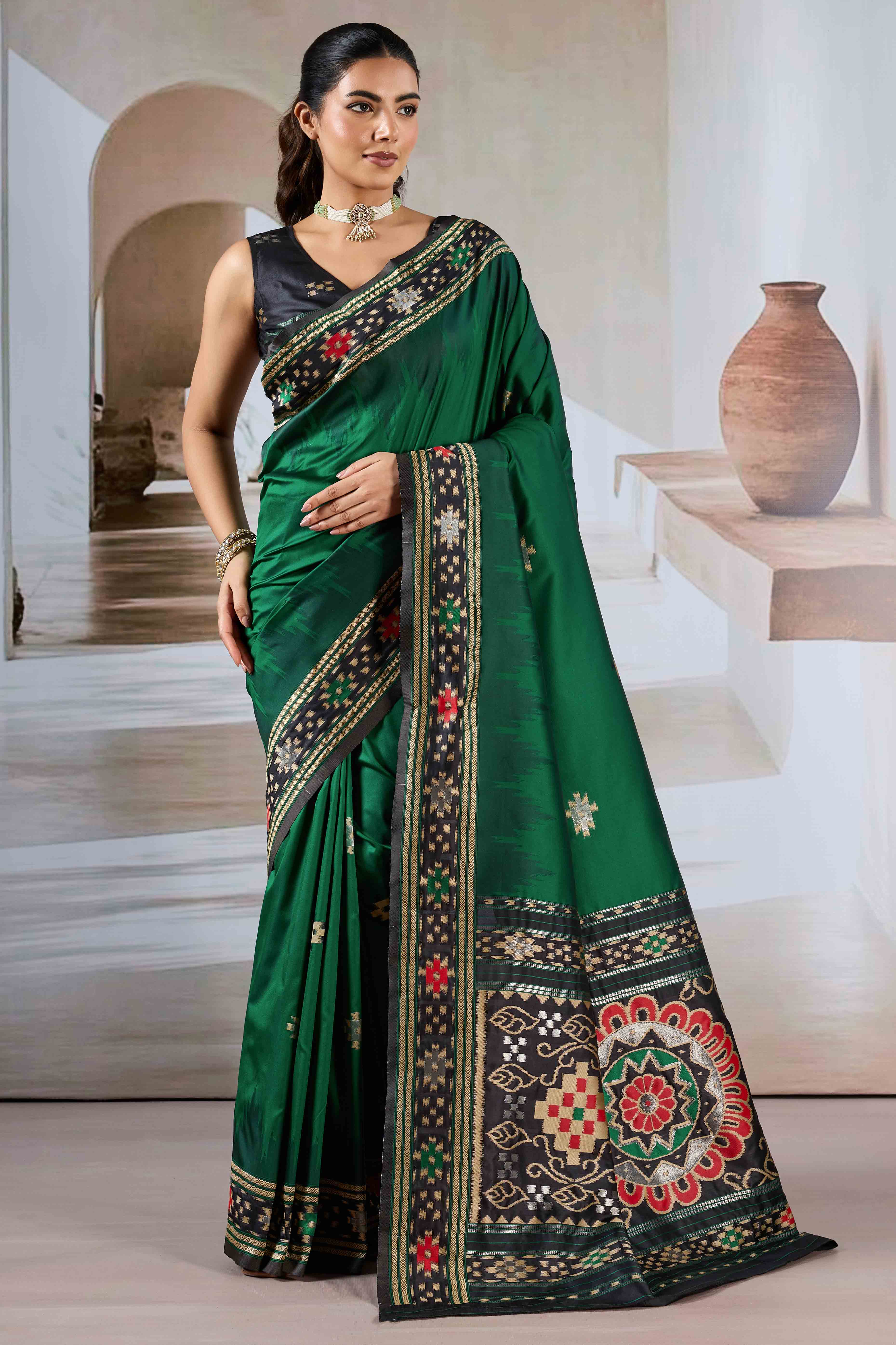 Green Art Silk Saree Adorned with Intricate Patola Style Woven Designs