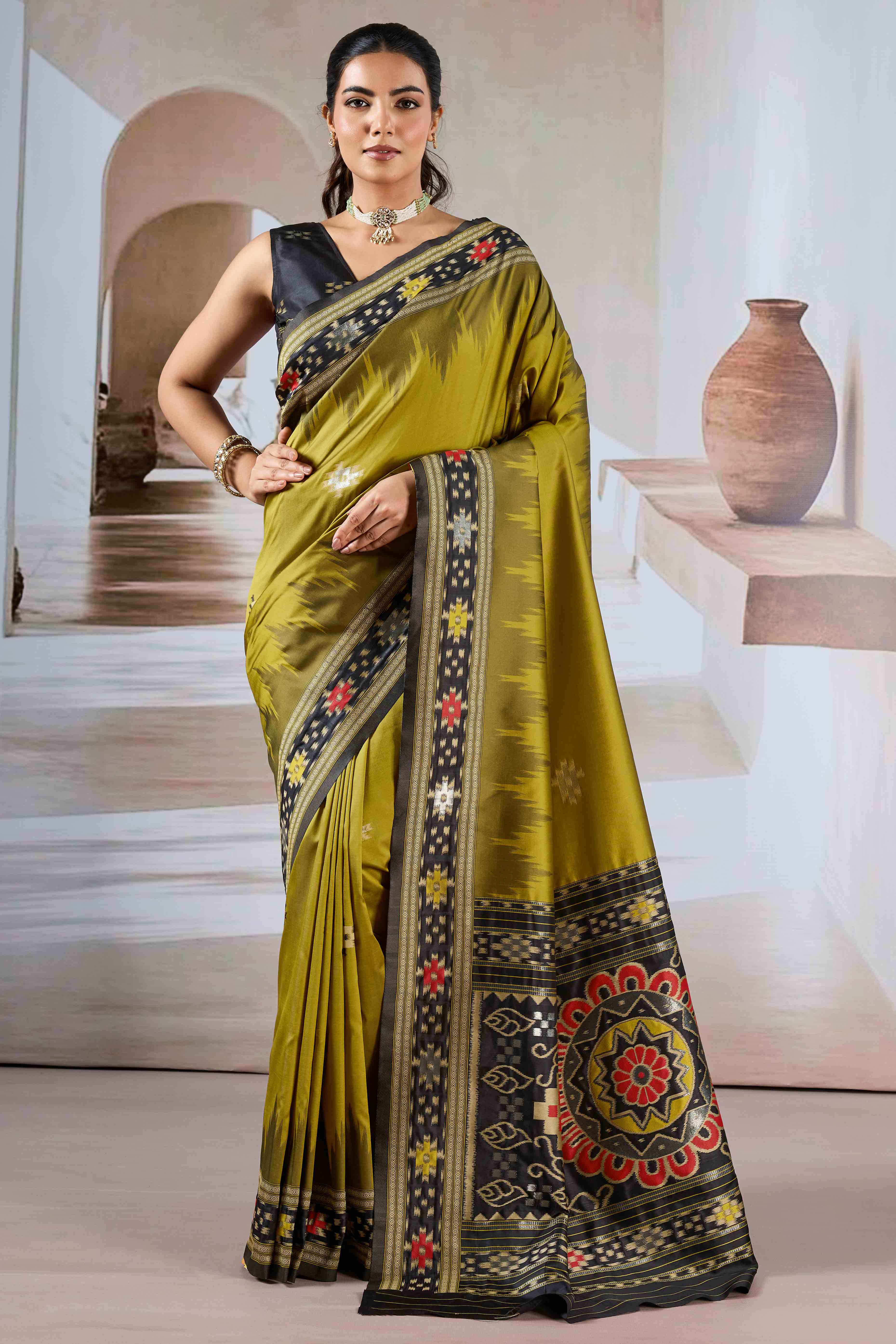 Olive Art Silk Saree Adorned with Intricate Patola Style Woven Designs