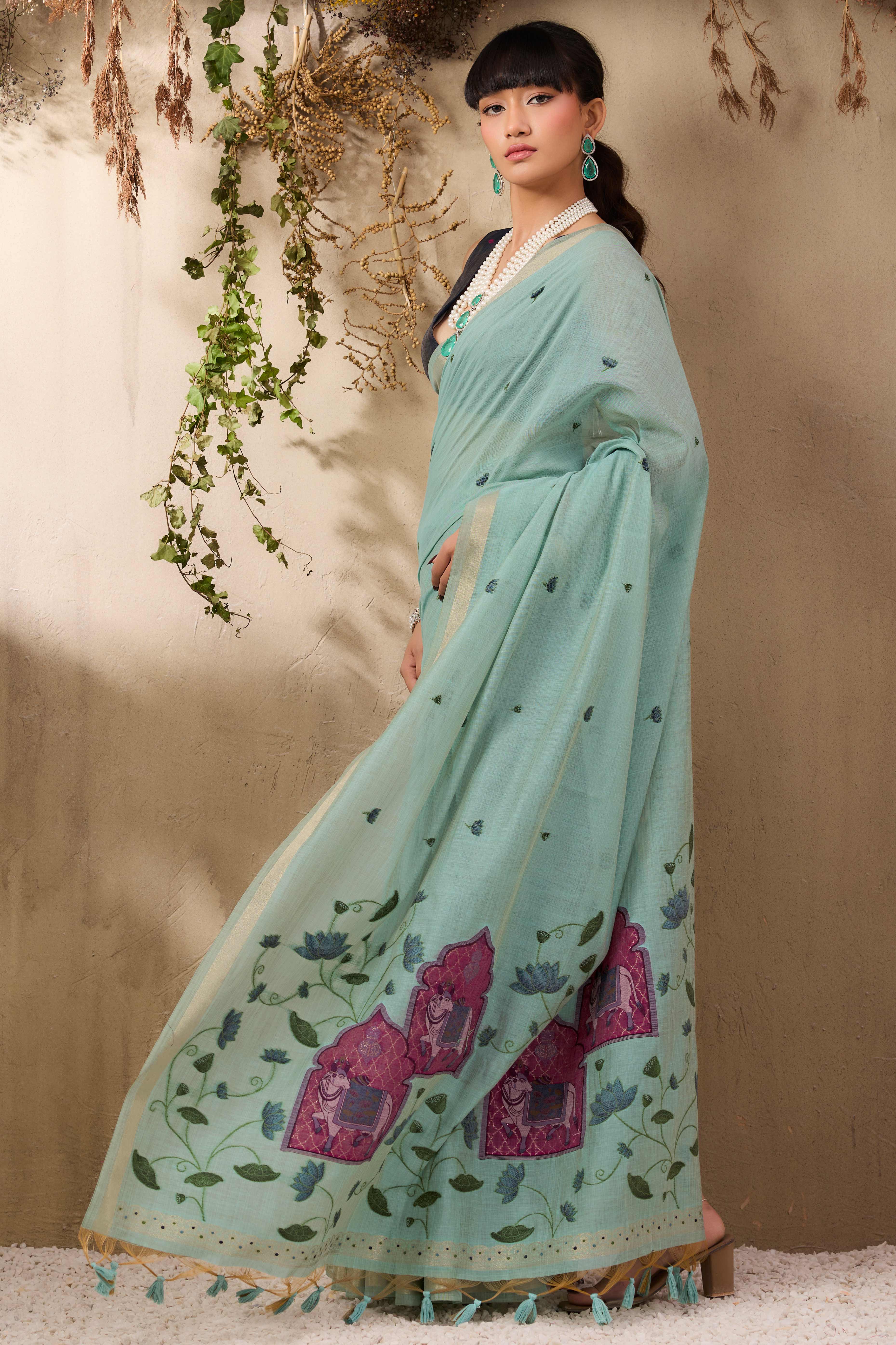 Sea Green Lightweight Handloom Munga Cotton Blend Saree Accented with Floral Woven Motifs