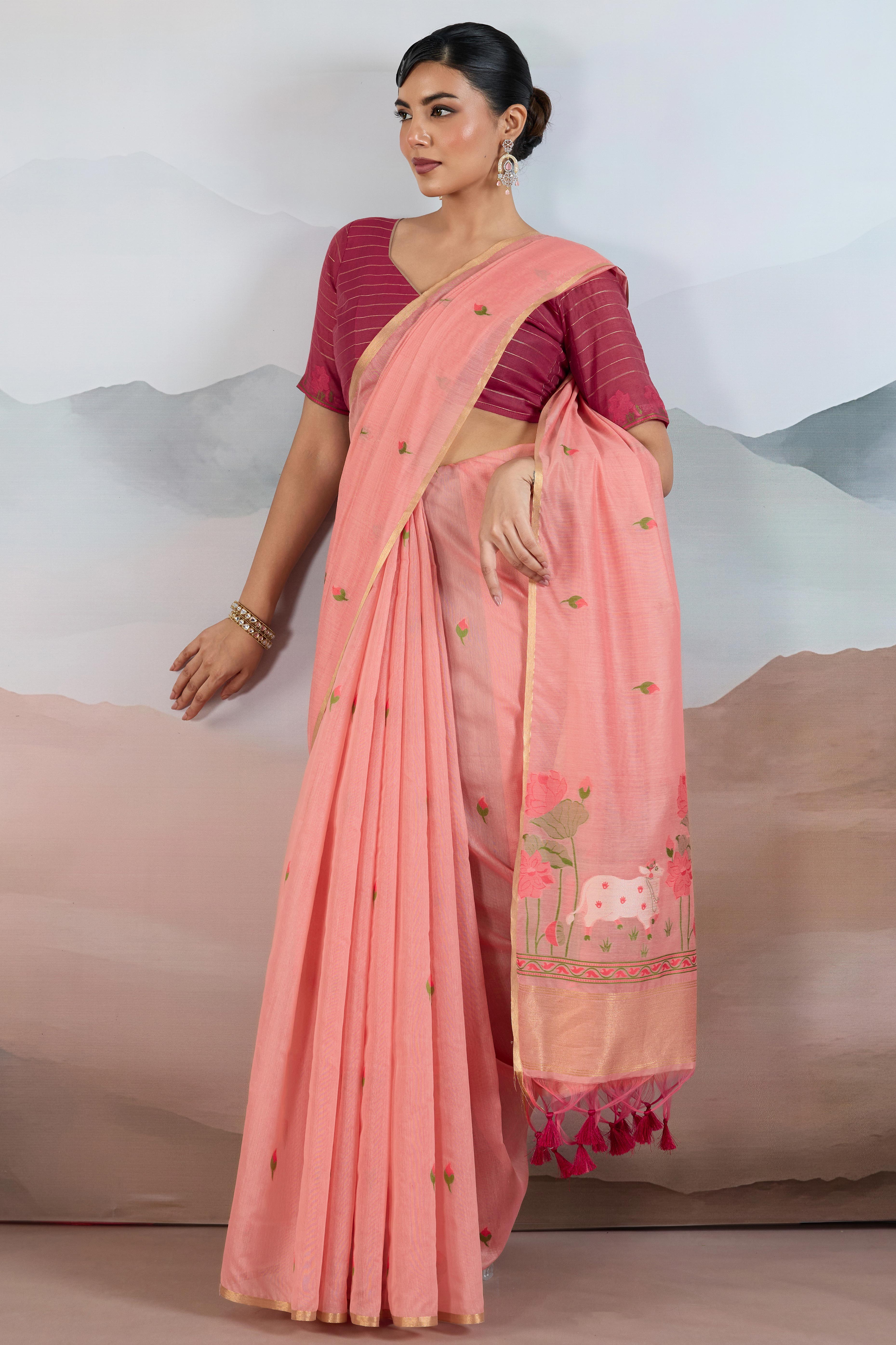 Trendy Peach Cotton Blend Weaving Saree Showcasing Floral & Animal Motif & Classic Tassel Pallu
