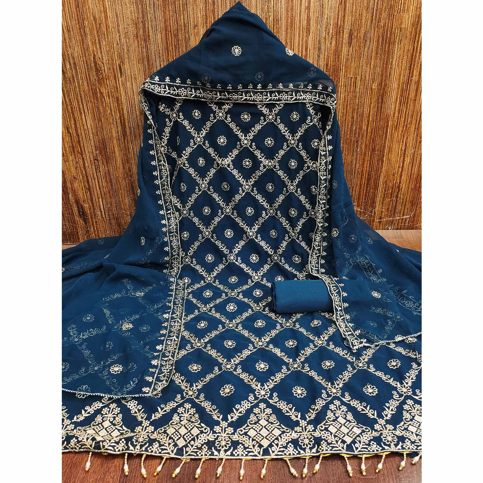 A Mesmerizing Creation Blue Floral Embroidered Georgette Dress Material