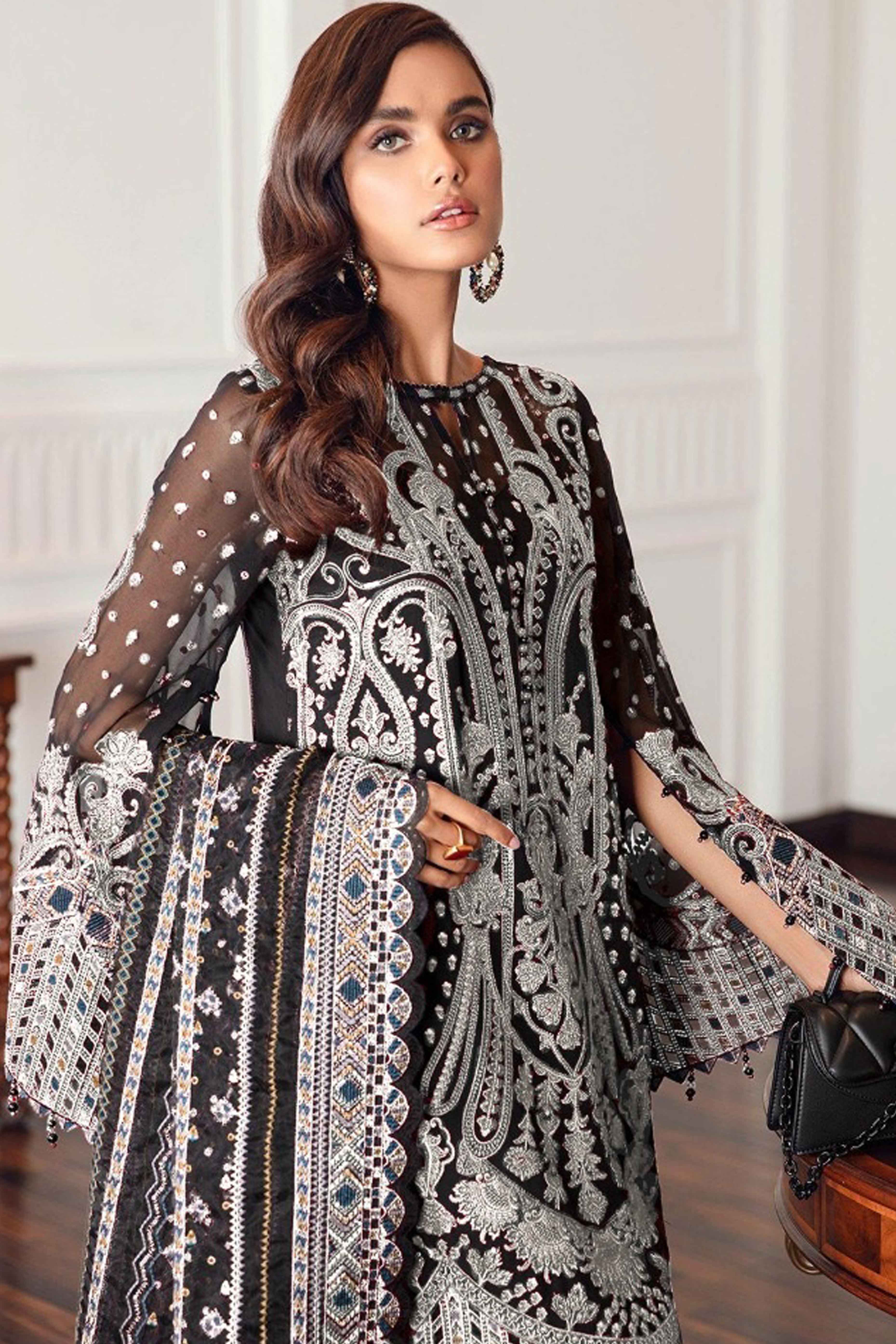 Black Georgette Semi Stitched Suit With Floral White Embroidery & Zarkan Work