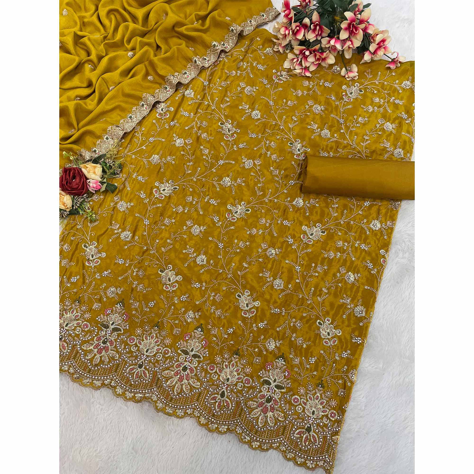 Embroidered Mustard Semi Stitched Suit With A Touch of Sequin & Studded Zarkan Work