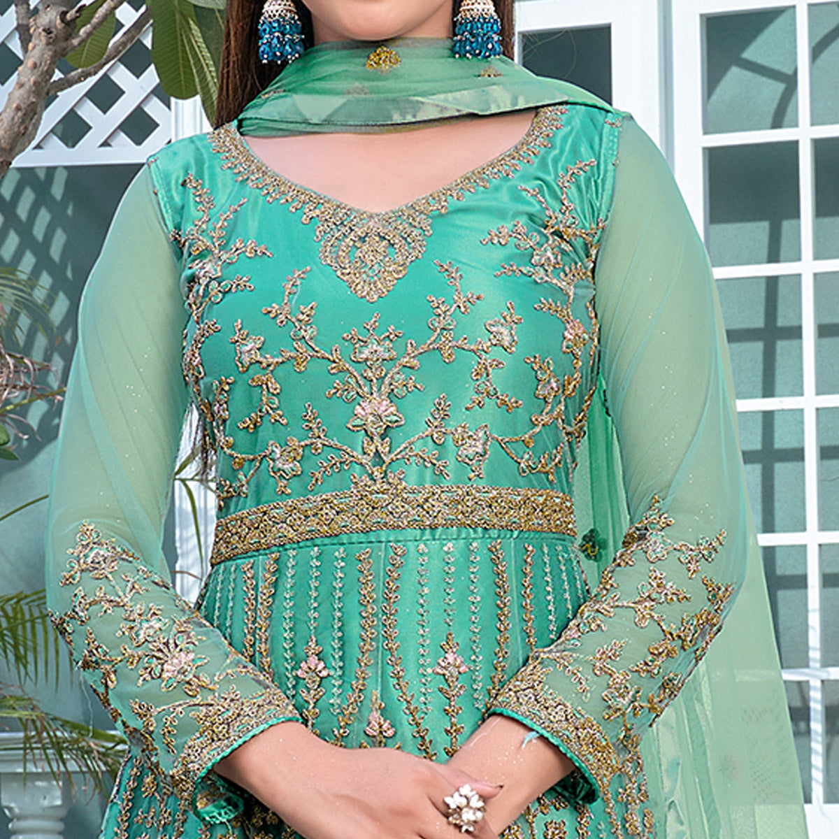 Turquoise Floral Sequins Embroidered Net Semi Stitched Anarkali Suit