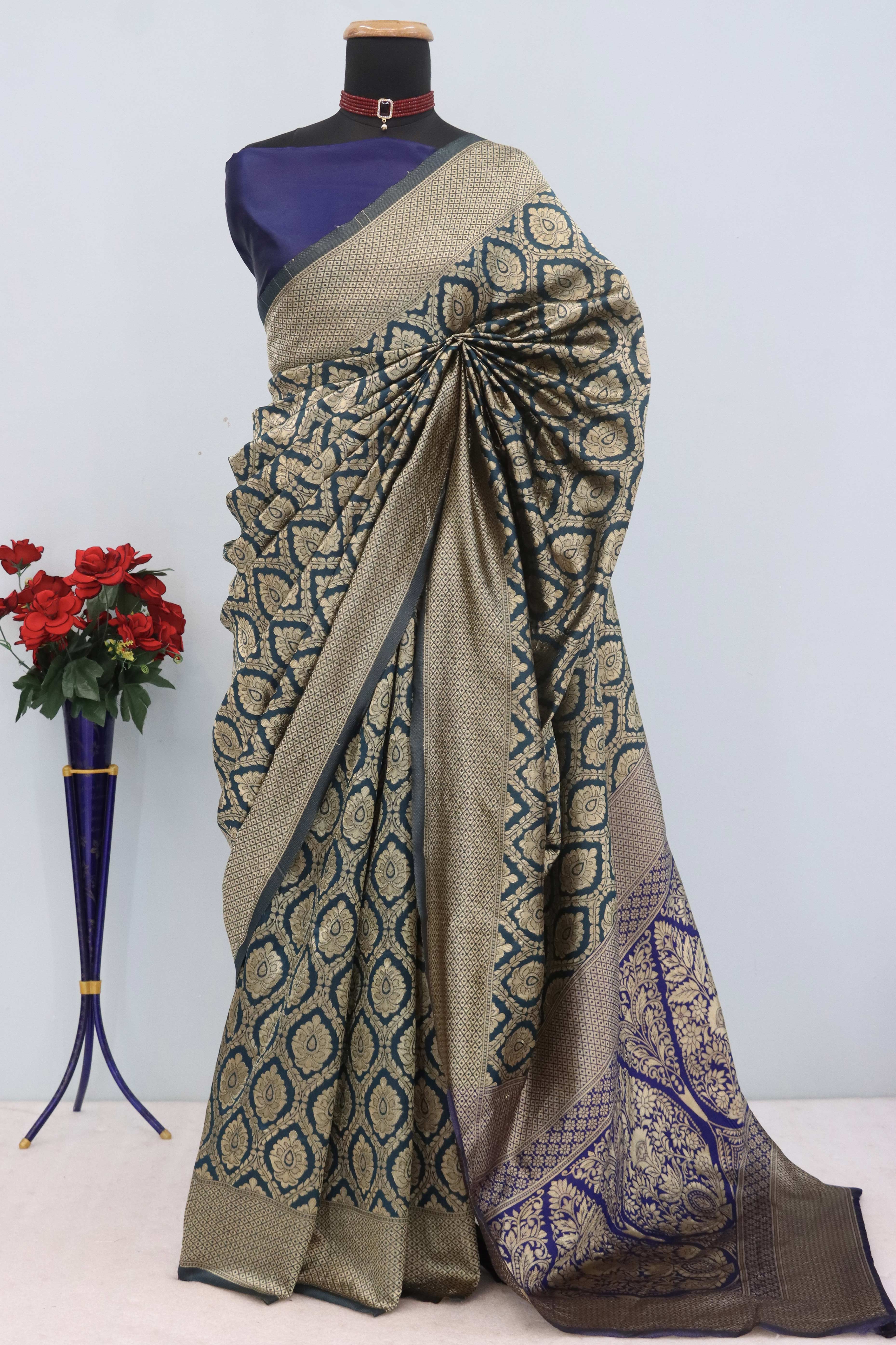 Charming Dark Teal Banarasi Silk Saree Adorned With Floral Zari Weaving