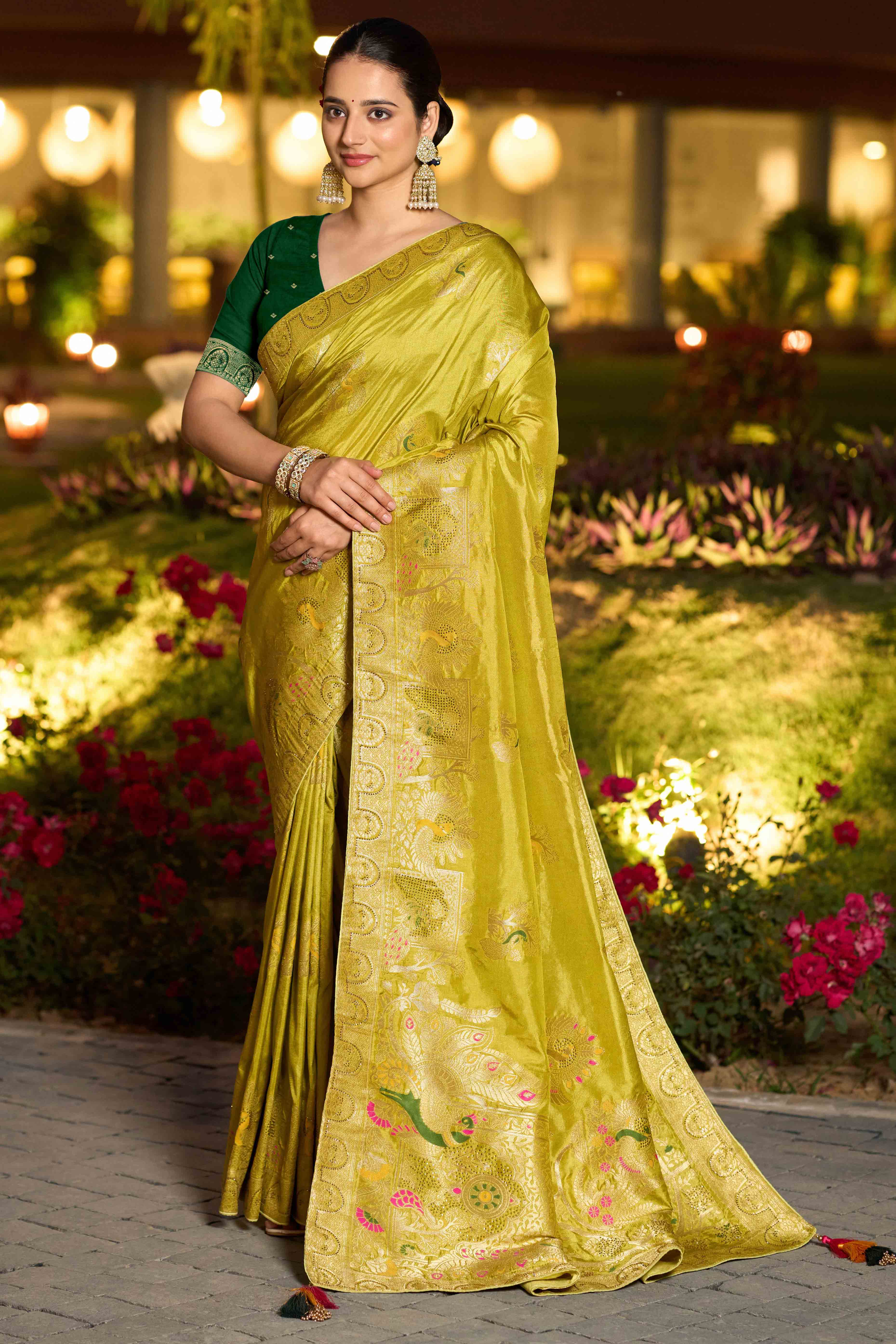 Graceful Green Dola Silk Saree With Intricate Zari Weaving & Sparkling Swarovski Accents