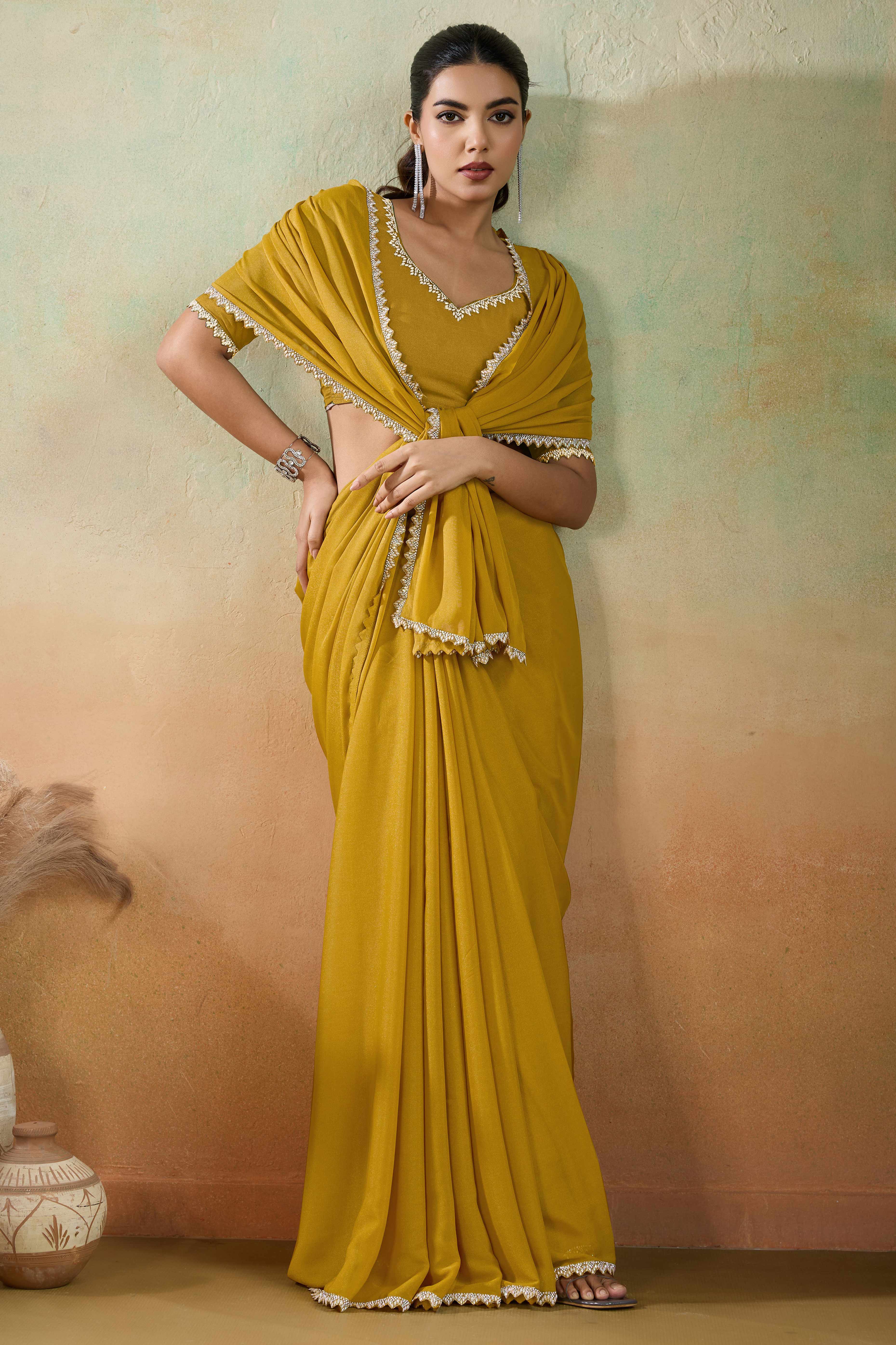 Mustard Solid Matt Georgette Saree With Ceramic Embellished Lace Border