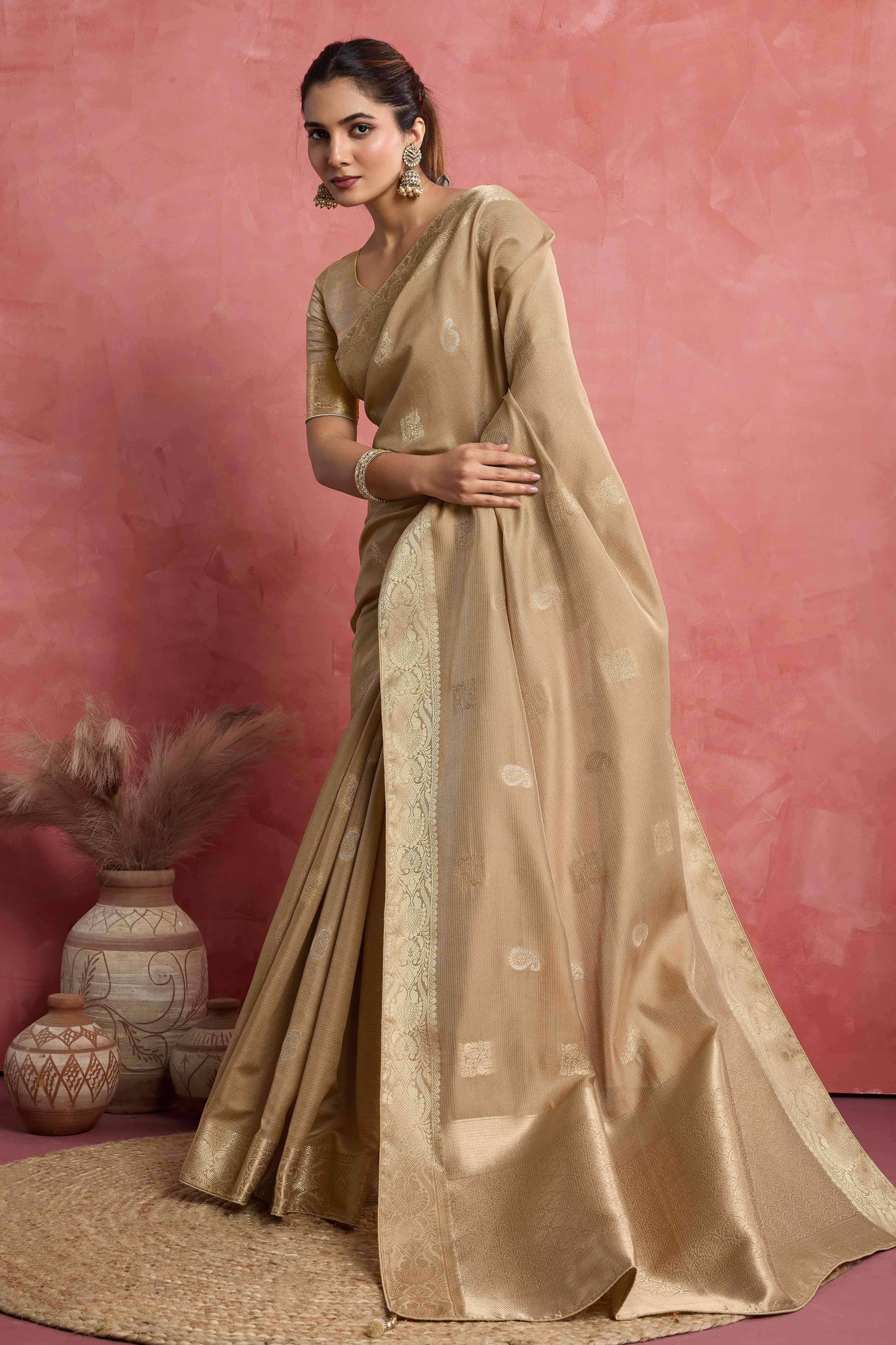 Contemporary Beige Silk Blend Saree Flaunting Alternate Butta With Piping & Tassel Accents