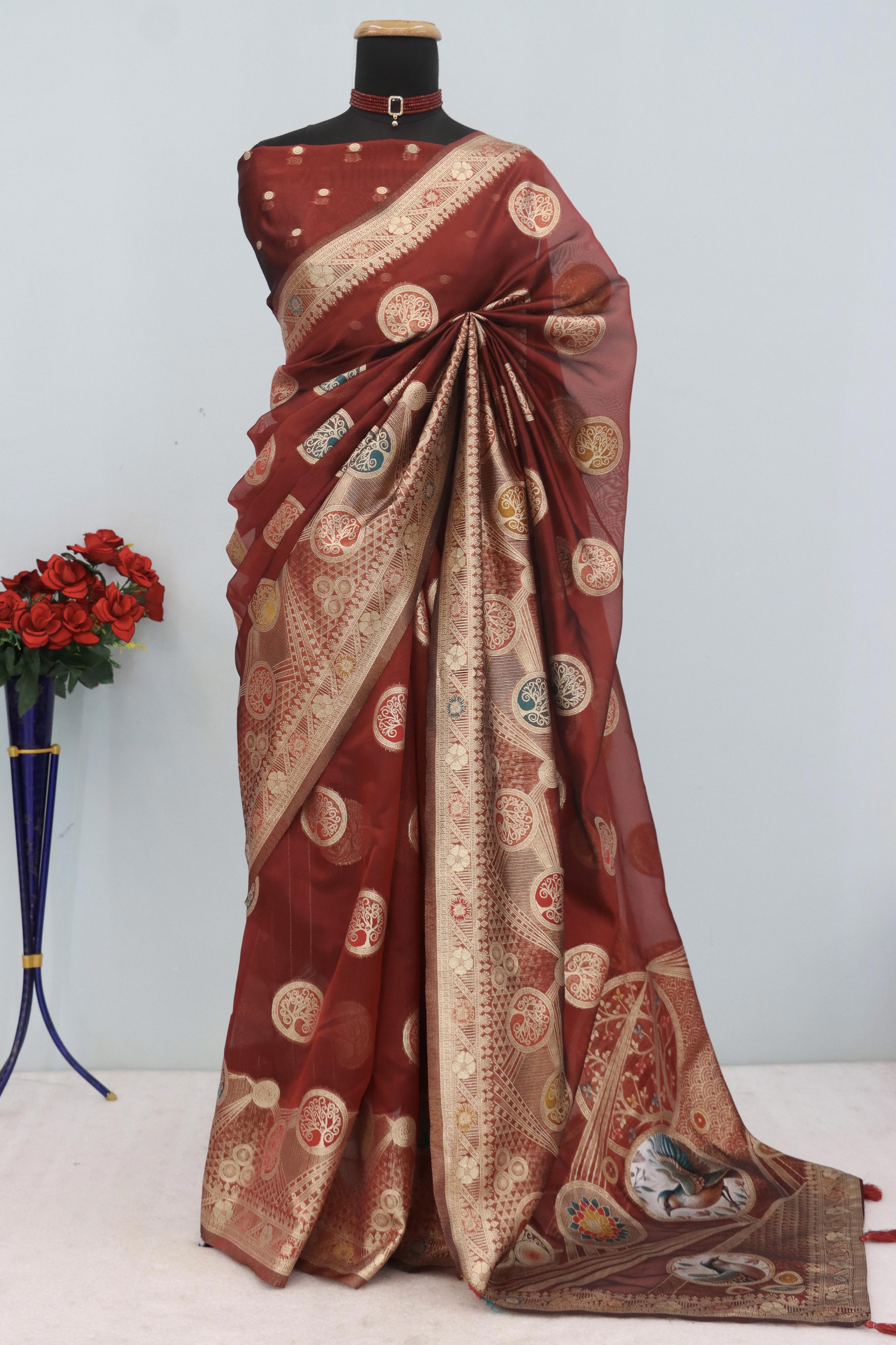 Charming Maroon Zari Woven Floral Organza Saree Accented With Digital Printed Pallu & Latkan