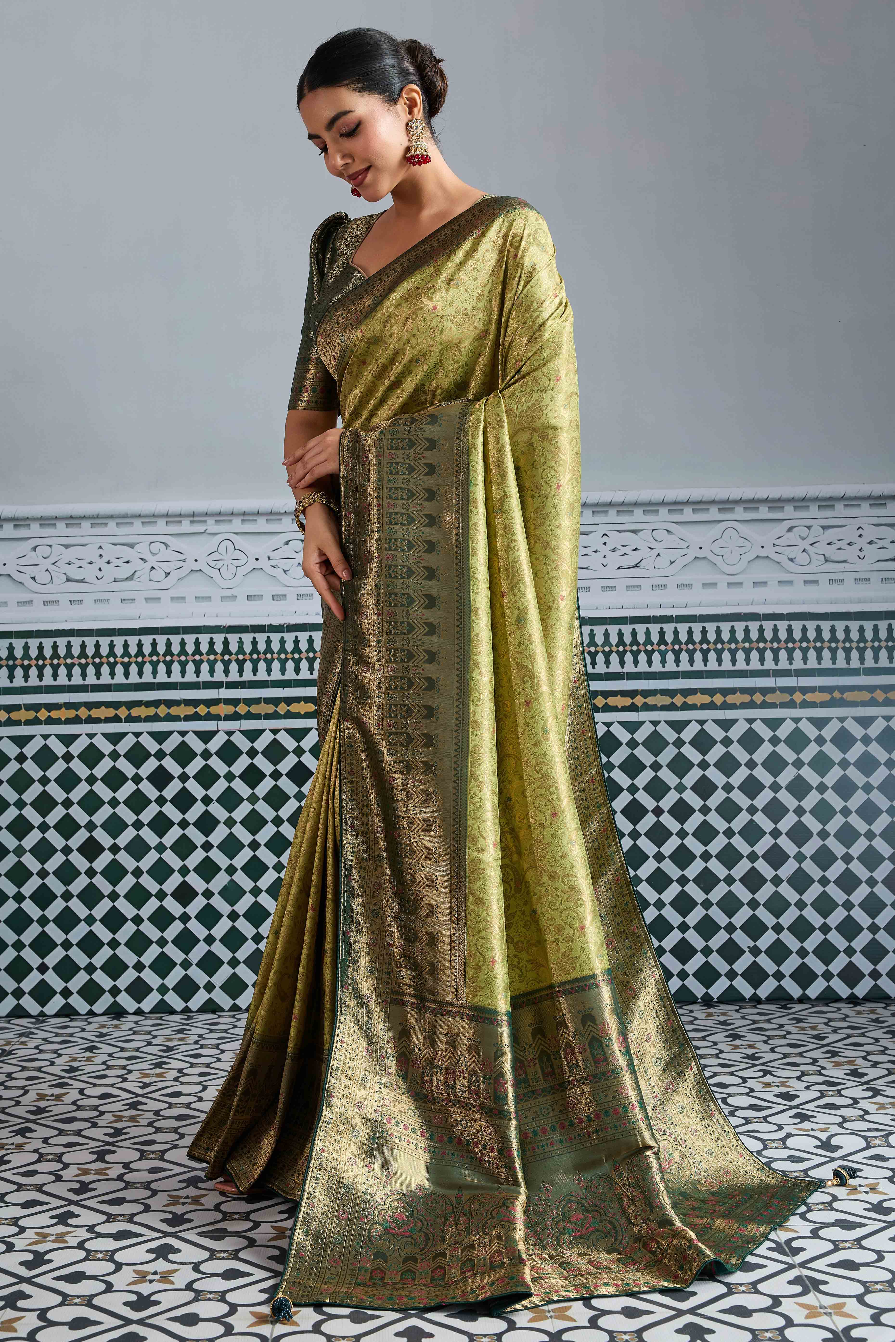 Pista Green Floral Meenakari Weaving Kanjivaram Silk Saree With Rich Piping & Tassel Pallu