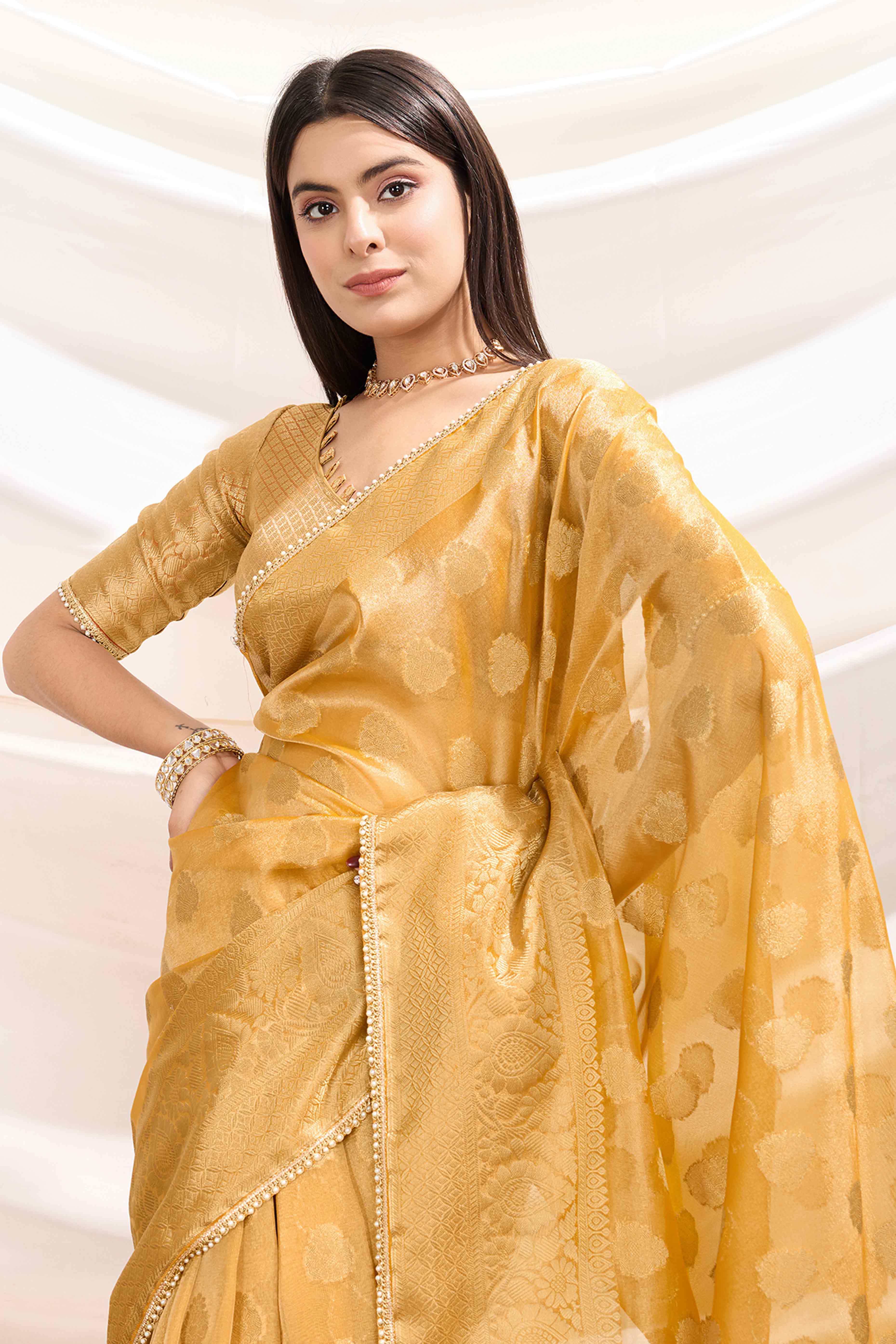 Mustard Floral Woven Tissue Silk Saree With Pearl Lace & Designer Tassels