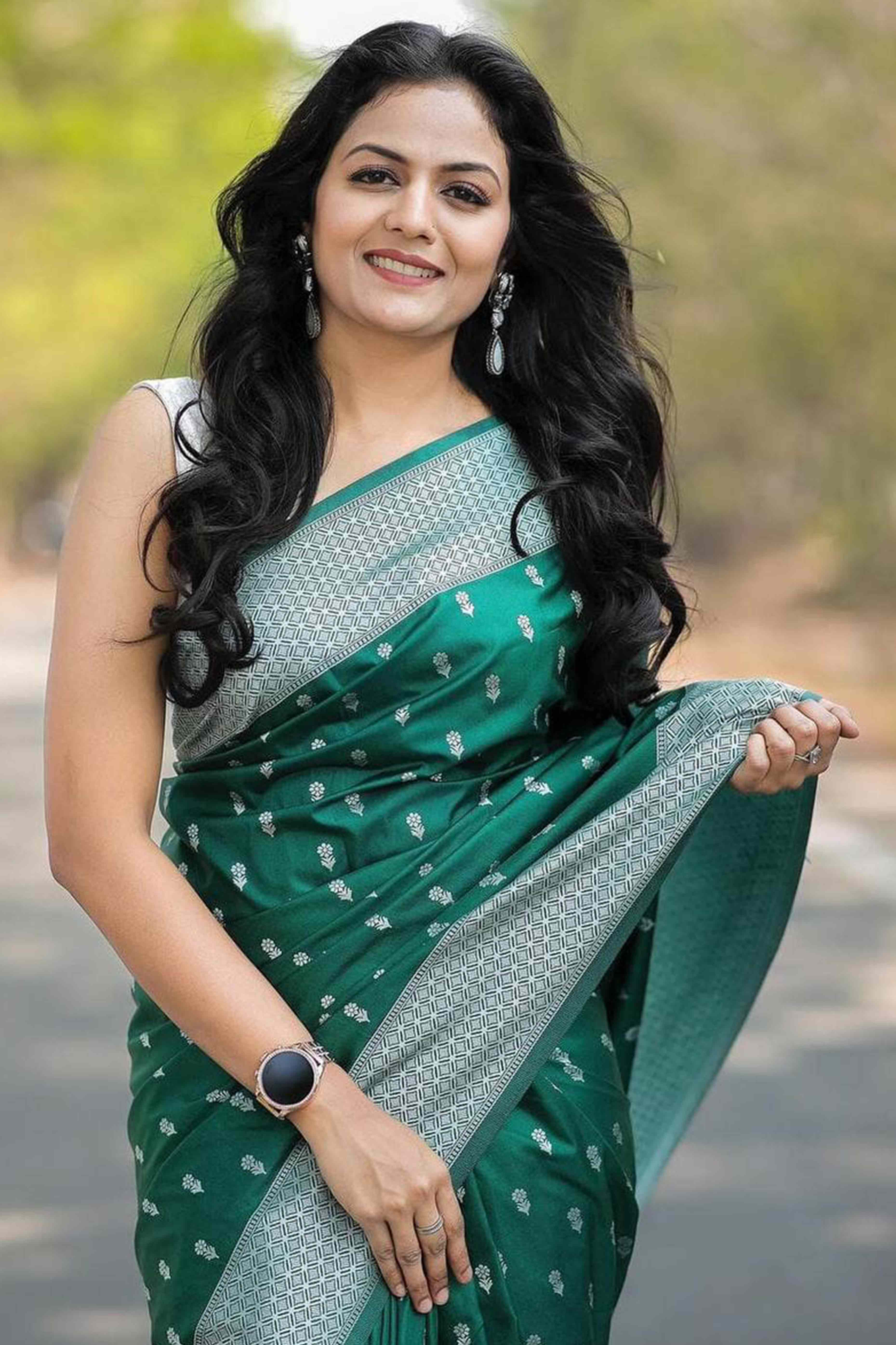 Green Floral Woven Lichi Banarasi Silk Saree With Tassels