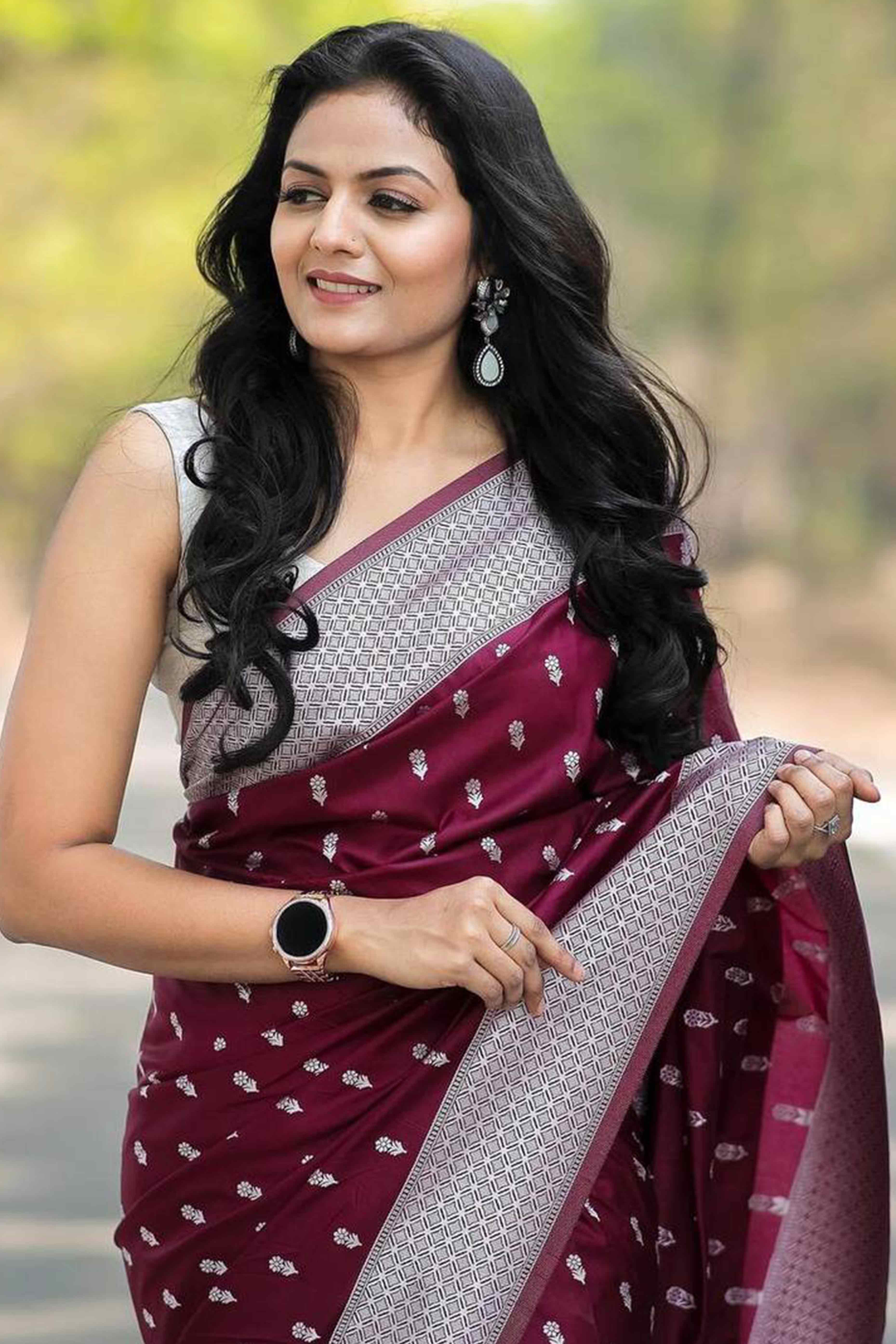 Wine Floral Woven Lichi Banarasi Silk Saree With Tassels