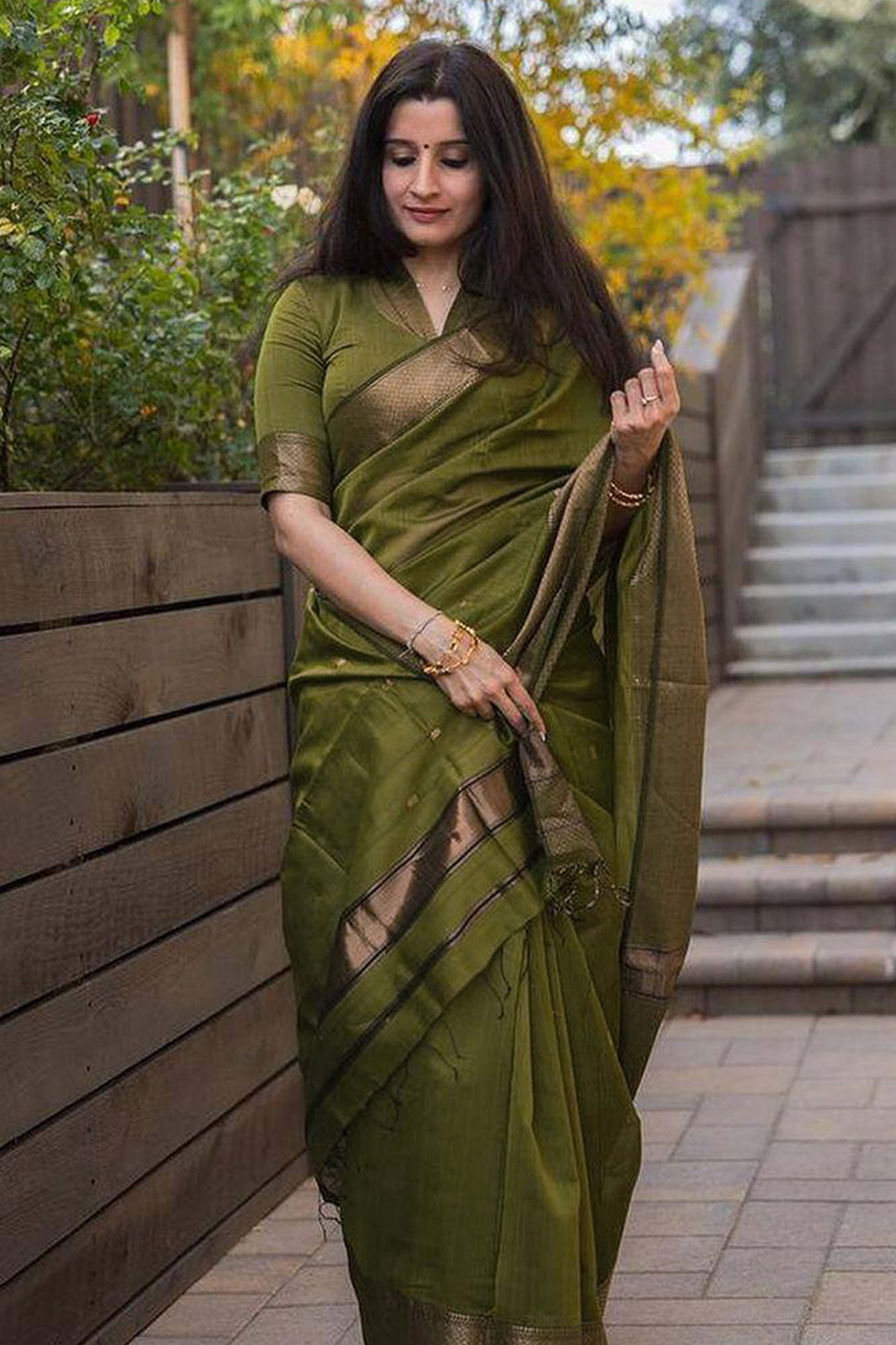 Exquisite Mehendi Green Floral Zari Woven Lichi Banarasi Silk Saree