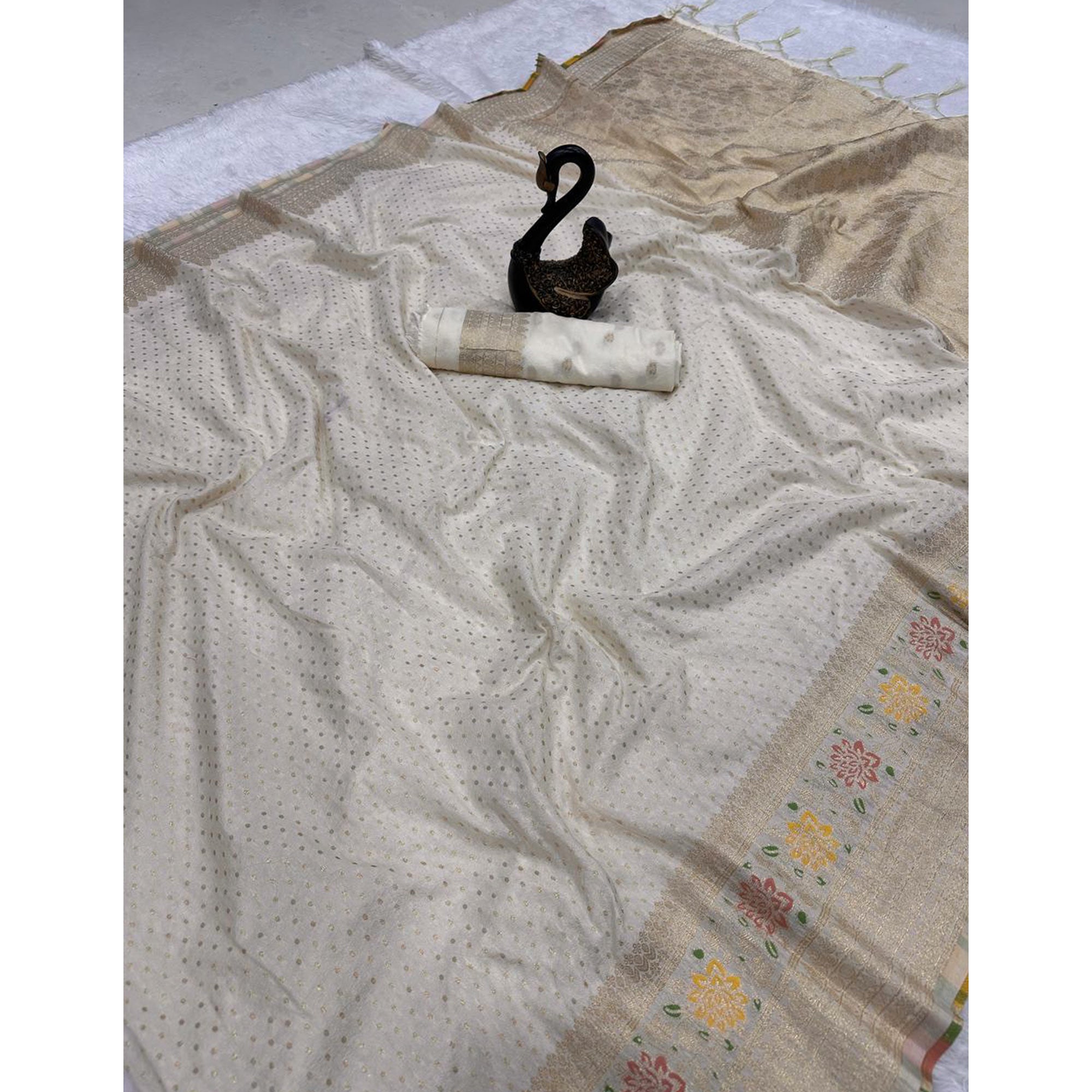 Off White Saree in Pure Georgette Featuring Delicate Zari Butti Work