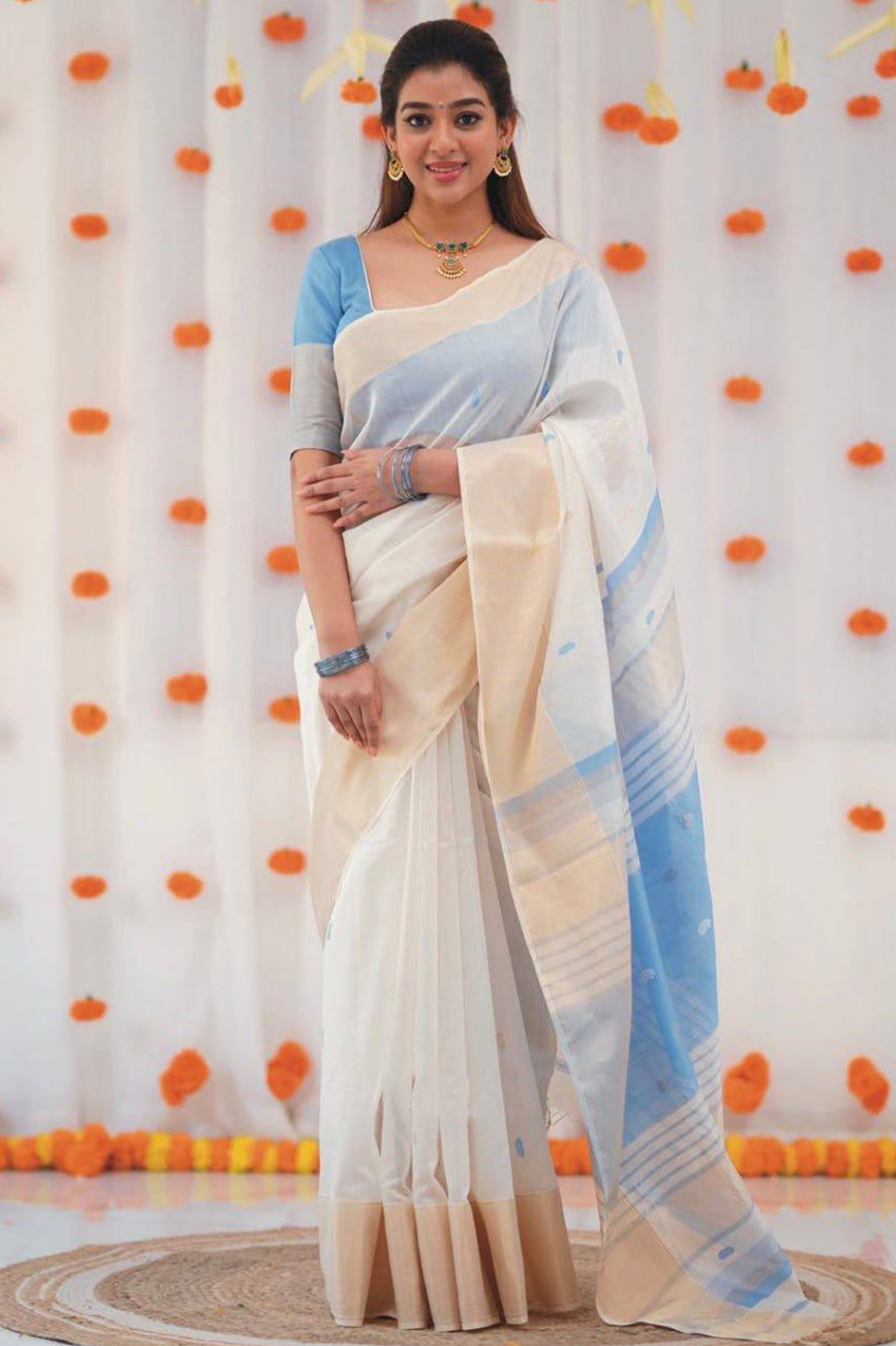 White and Blue Zari-Woven Linen Cotton Saree Offering a Refined Festive Look