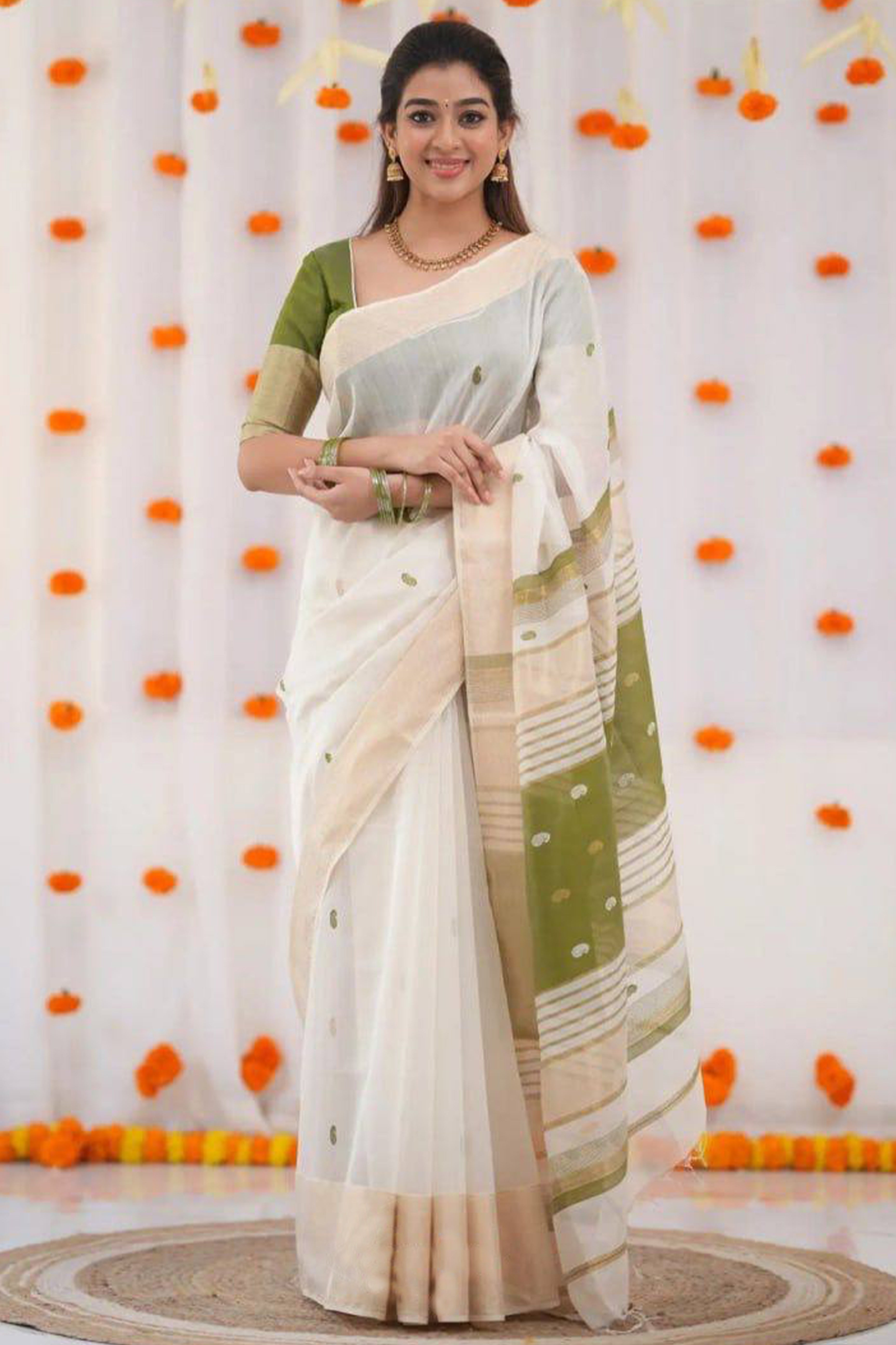 White and Green Zari-Woven Linen Cotton Saree Offering a Refined Festive Look
