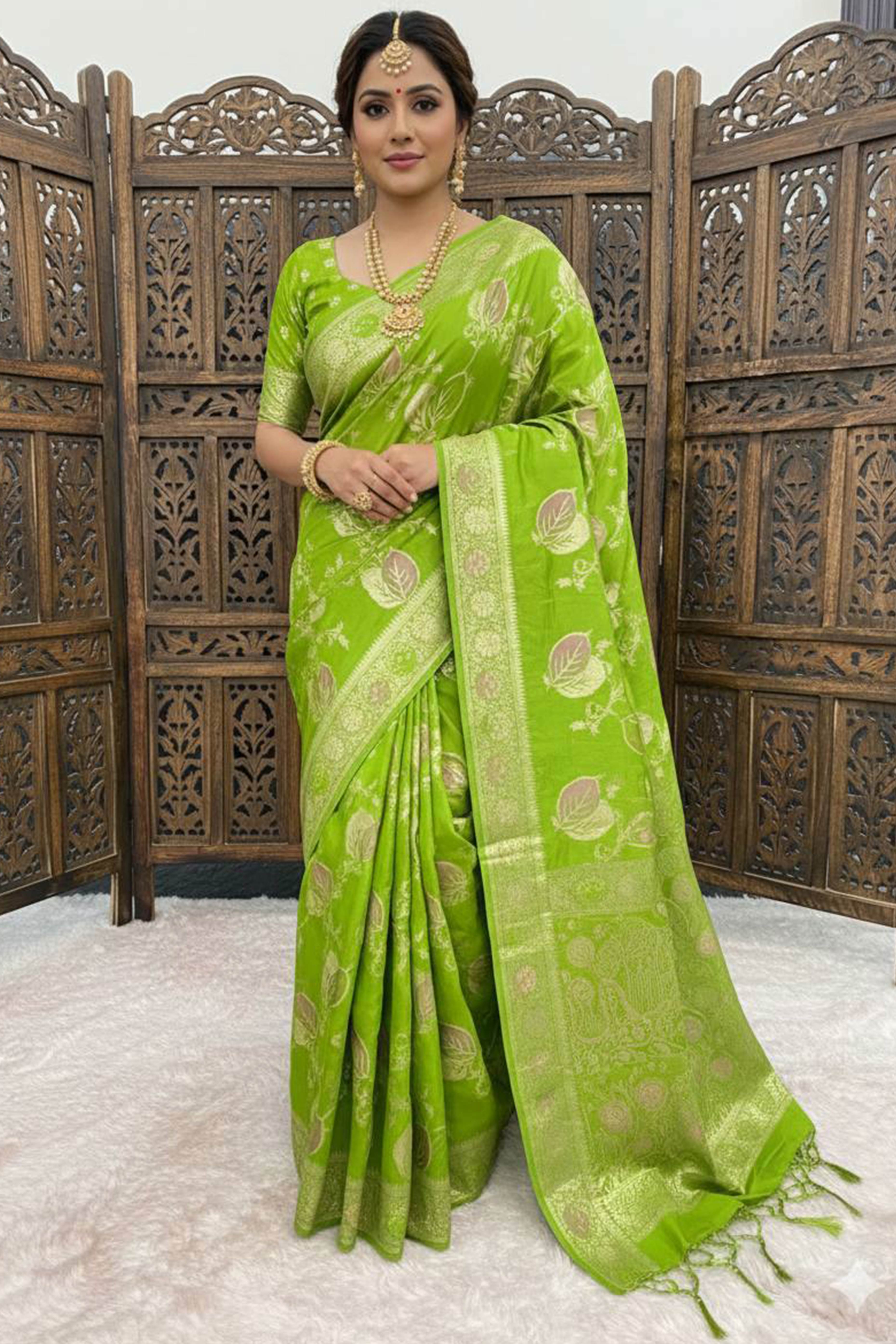 Green Soft Dola Silk Saree Adorned with Intricate Meenakari-Style Weaving