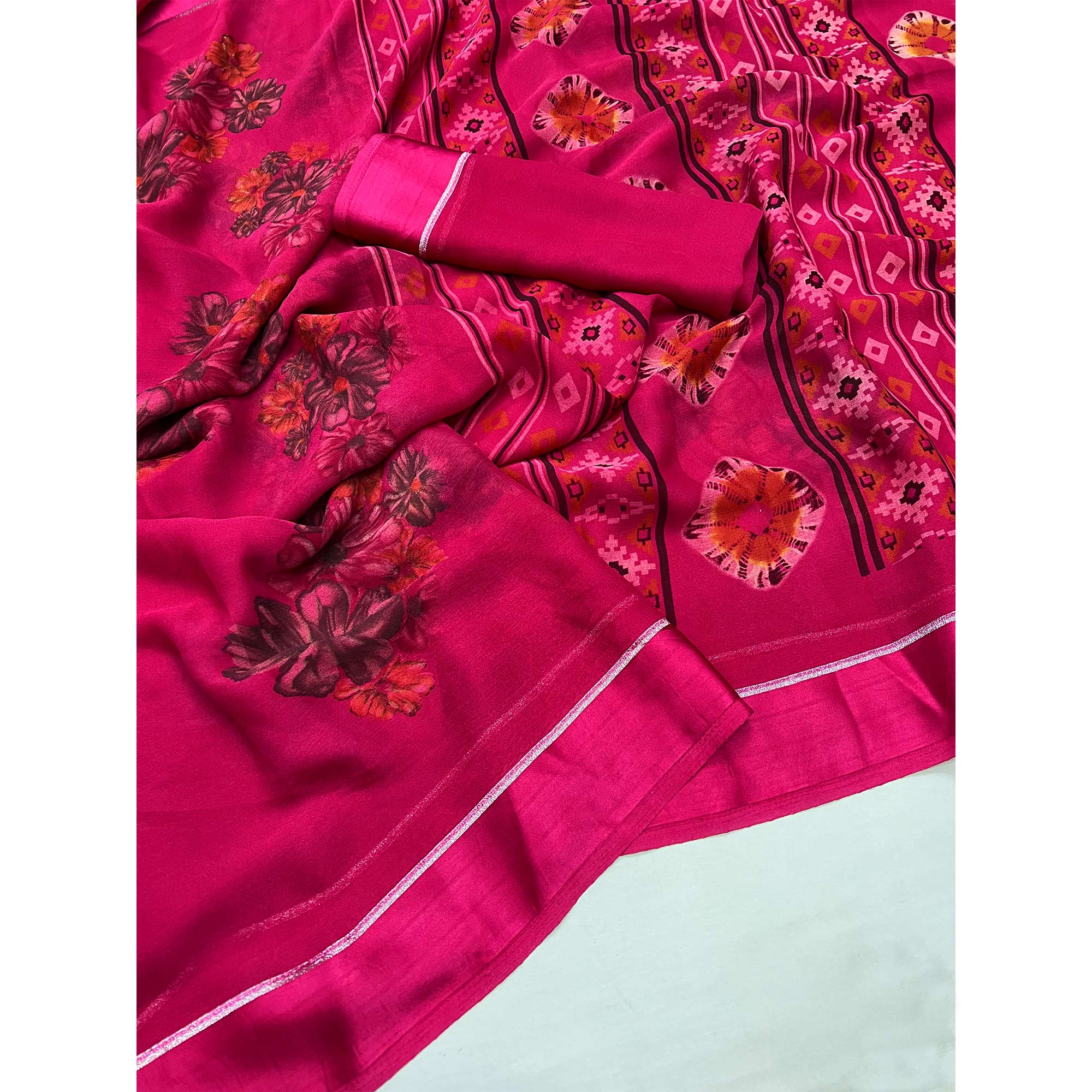 Rani Pink Floral Printed Georgette Saree With Fancy Zari Border