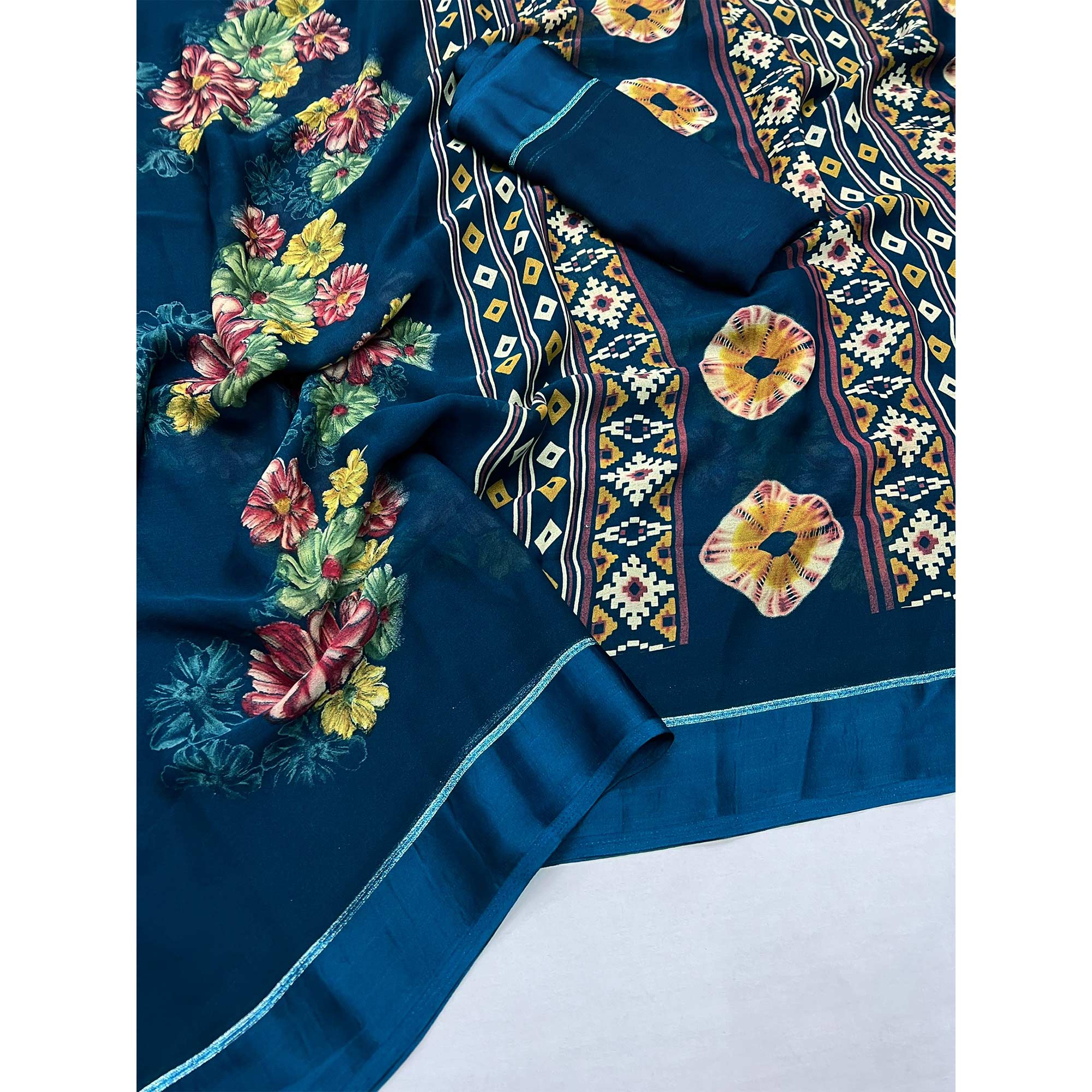 Blue Floral Printed Georgette Saree With Fancy Zari Border