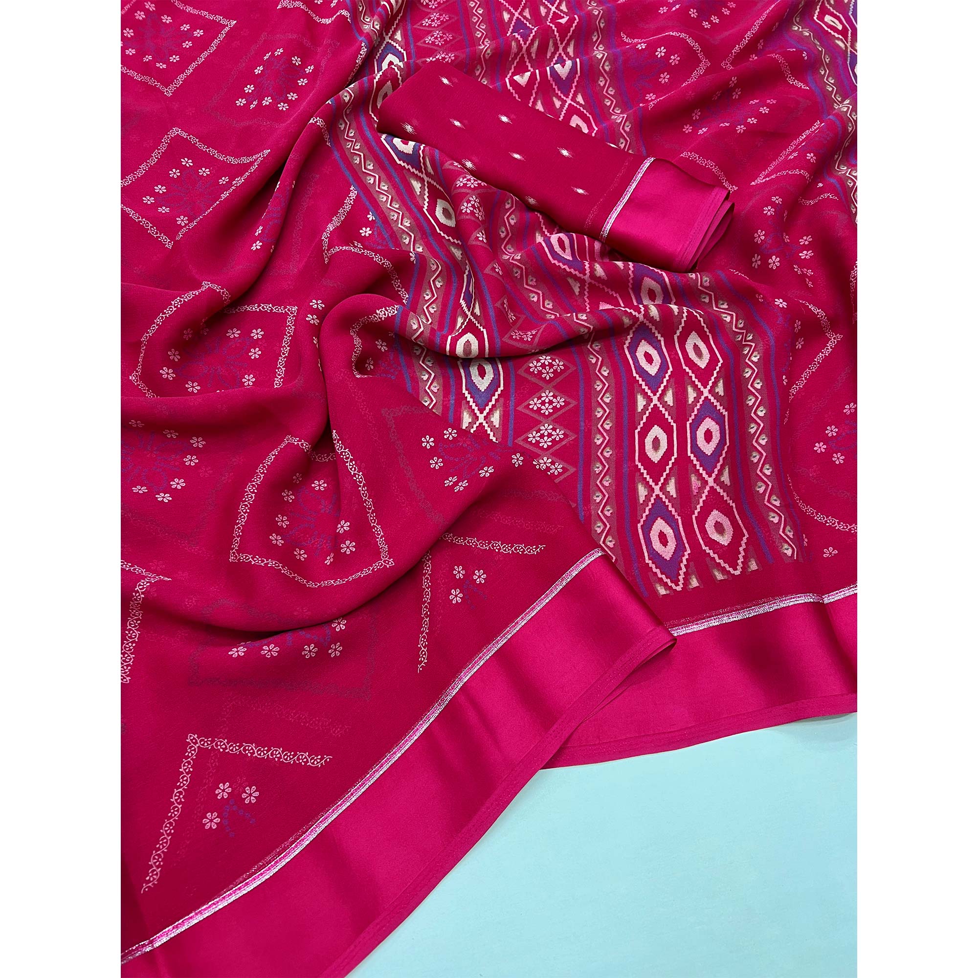 Rani Pink Floral Printed Georgette Saree With Fancy Zari Border