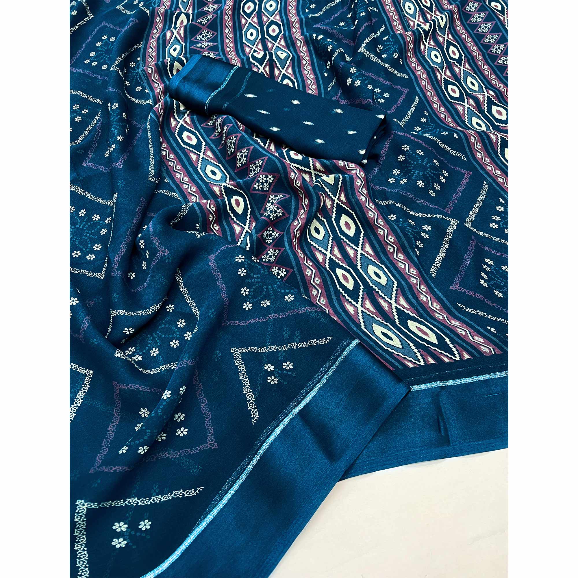 Blue Floral Printed Georgette Saree With Fancy Zari Border