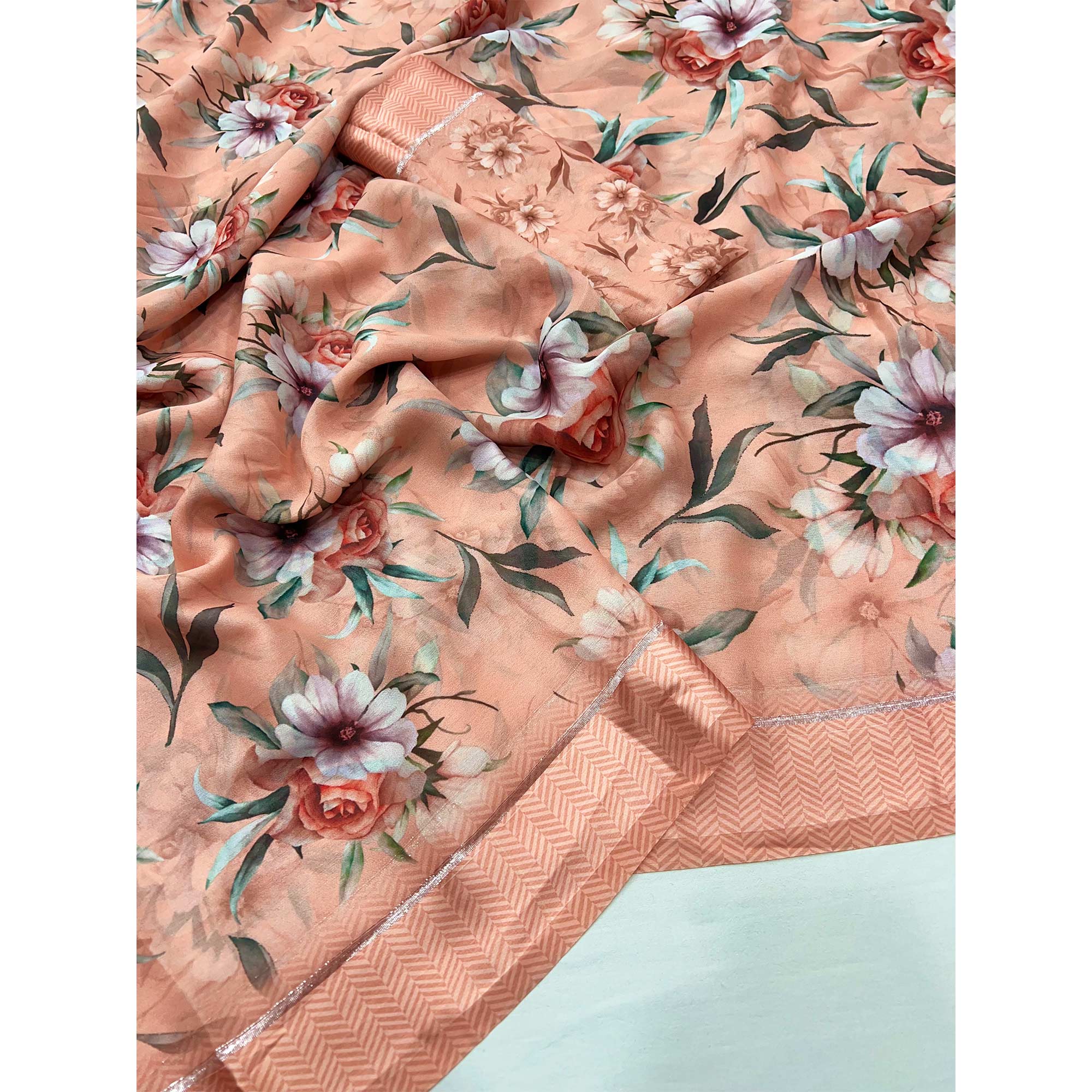 Peach Floral Digital Printed Georgette Saree With Fancy Zari Border