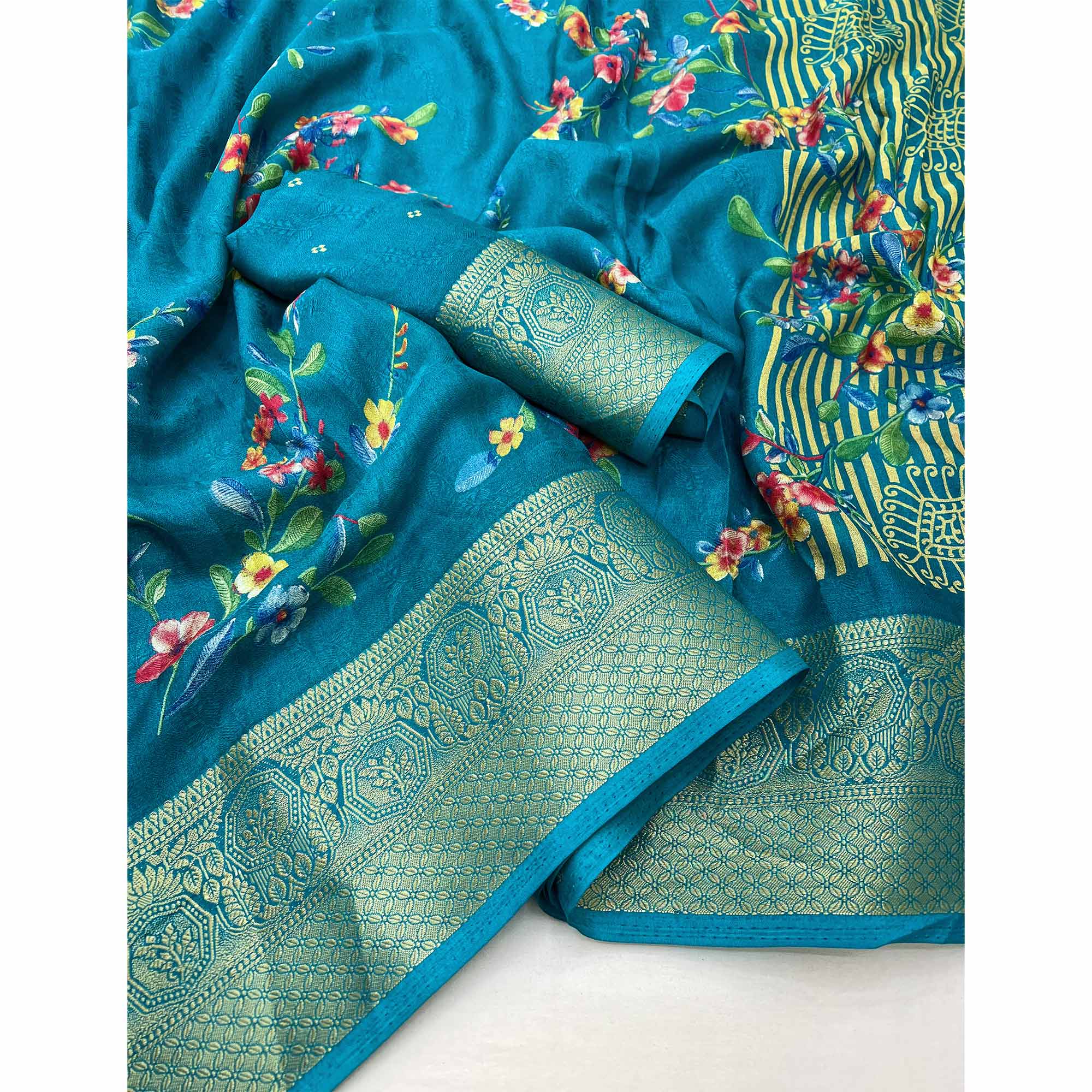 Blue Floral Printed Georgette Saree With Woven Border