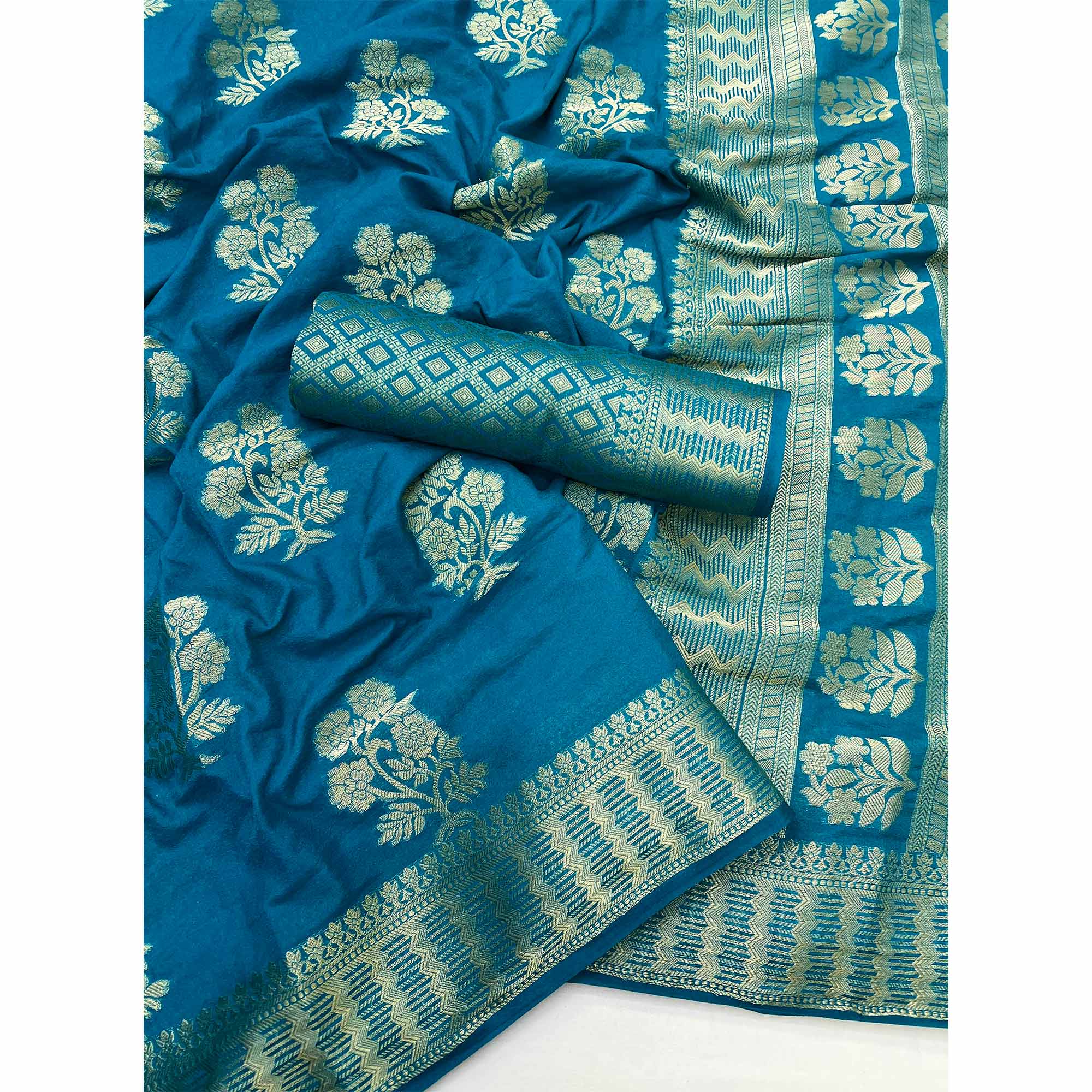 Teal Blue Crepe Silk Saree With Floral Zari Weaving & Stylish Tassel Pallu