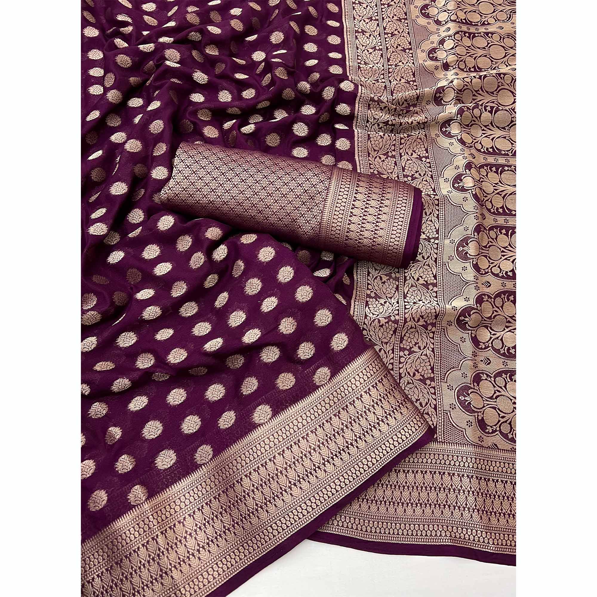 Wine Floral Zari Woven Crepe Silk Saree Accented With Tassel Pallu