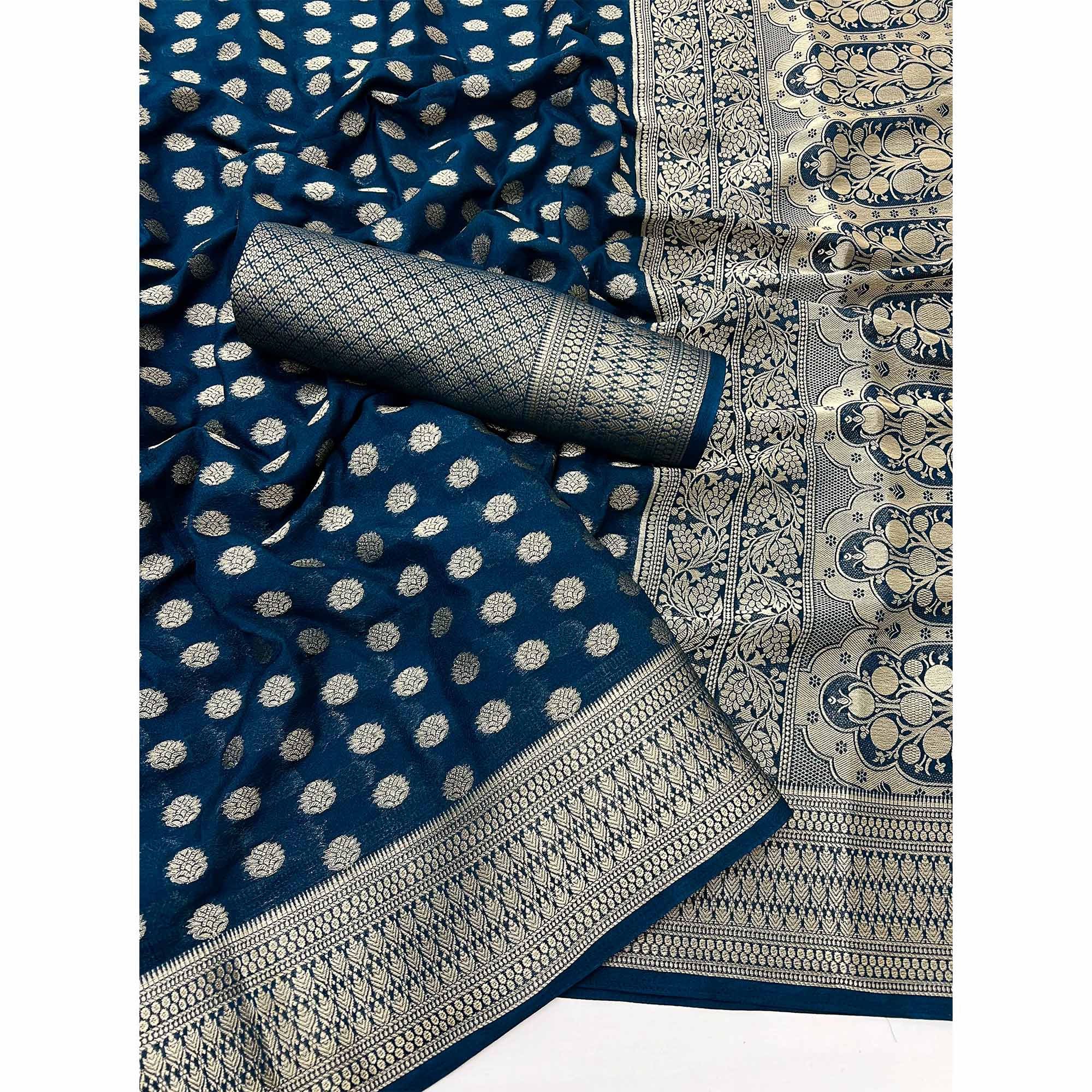 Dark Teal Blue Floral Zari Woven Crepe Silk Saree Accented With Tassel Pallu