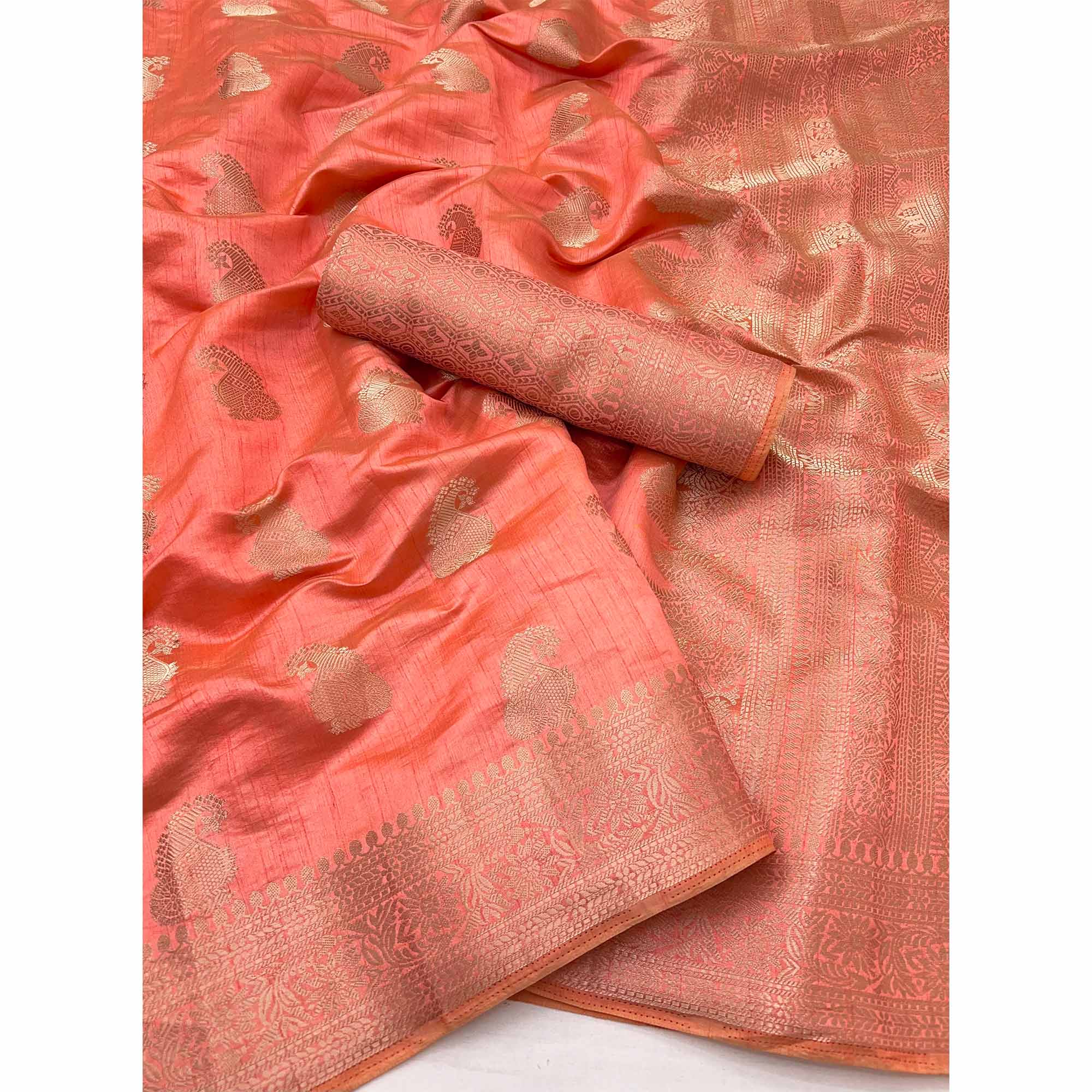Coral Pink Tusser Cotton Silk Saree Adorned With Floral Zari Weave & Tassel Pallu