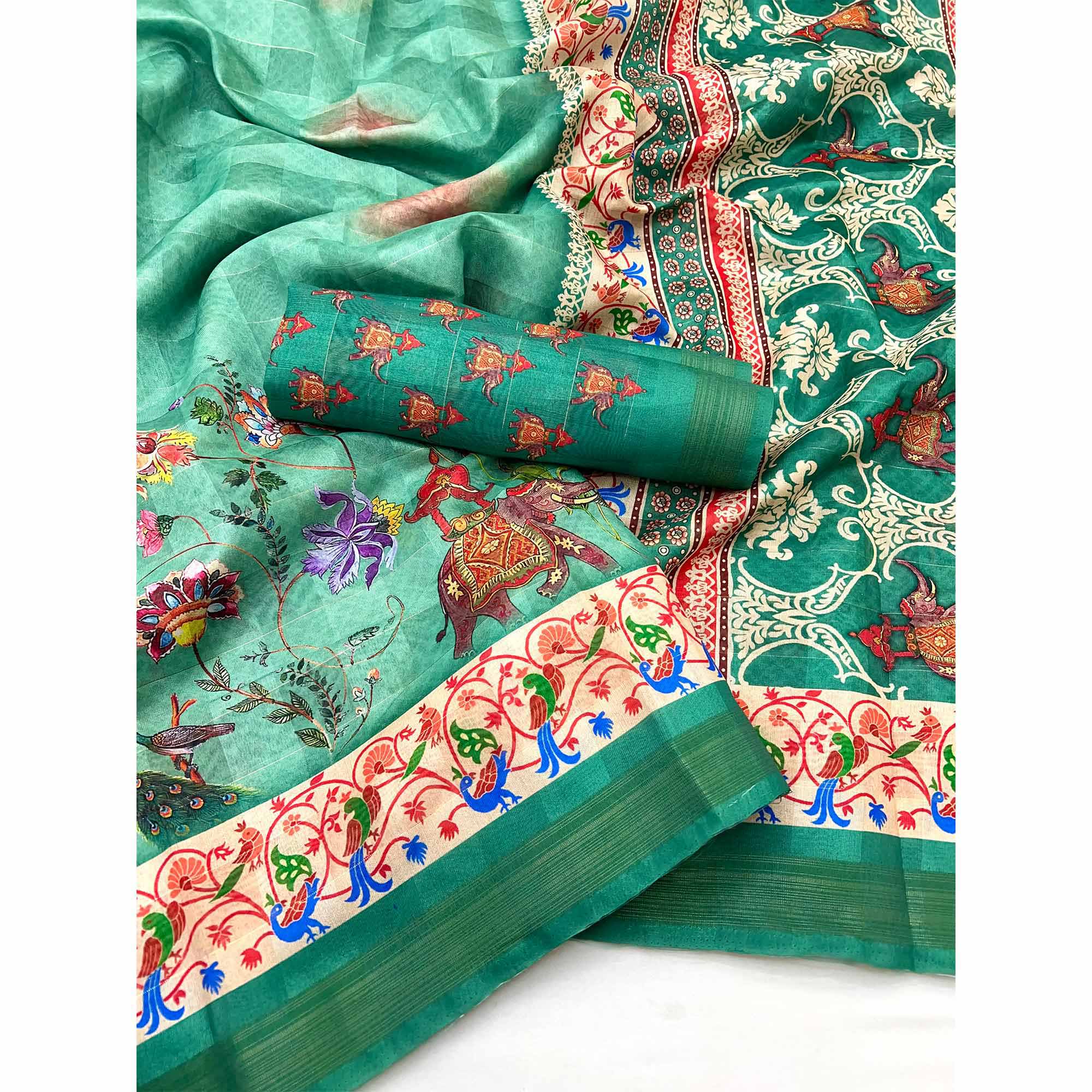 Rama Green Cotton Blend Saree Highlighted With Animal & Floral Digital Print