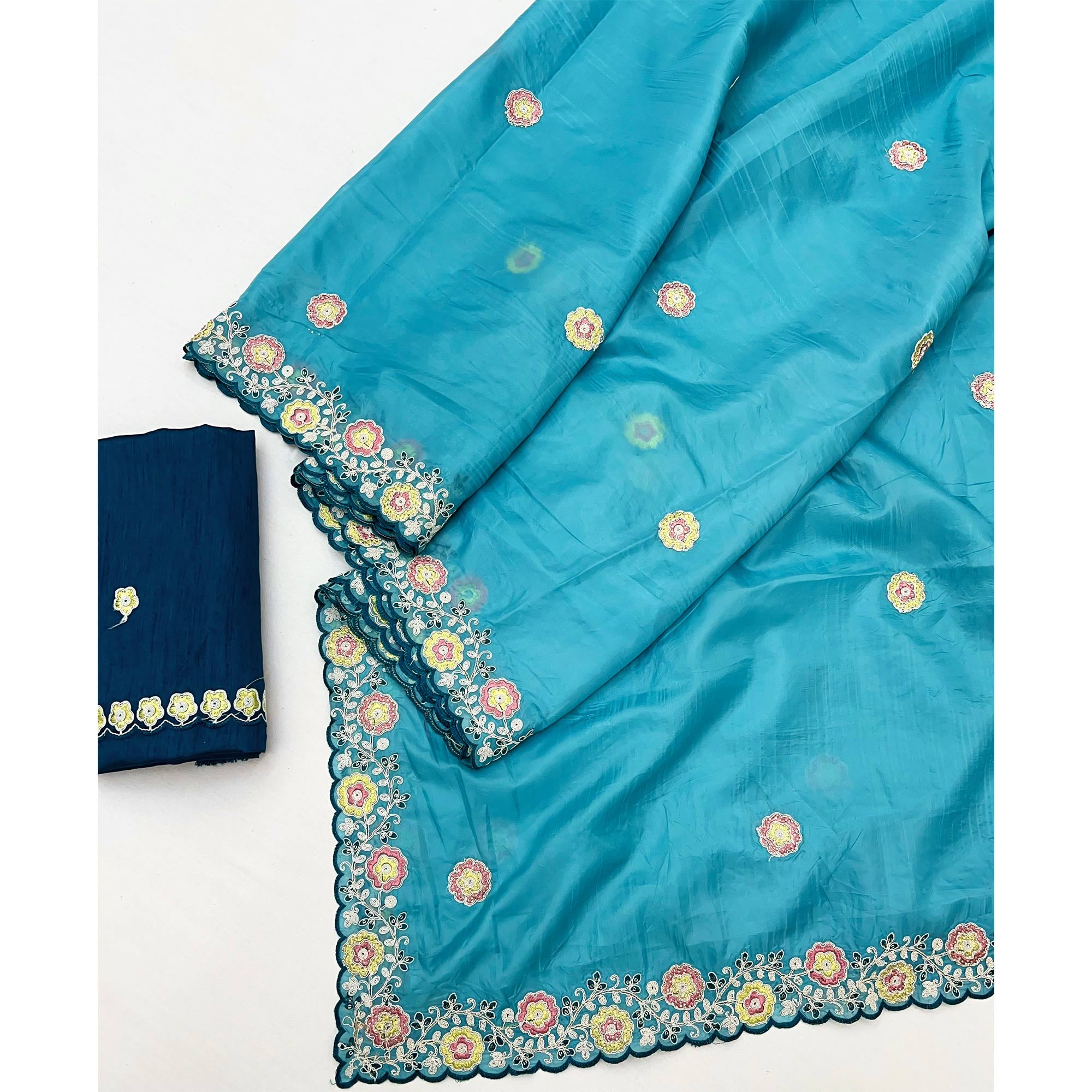 Blue Organza Saree Adorned with Intricate Floral Embroidery