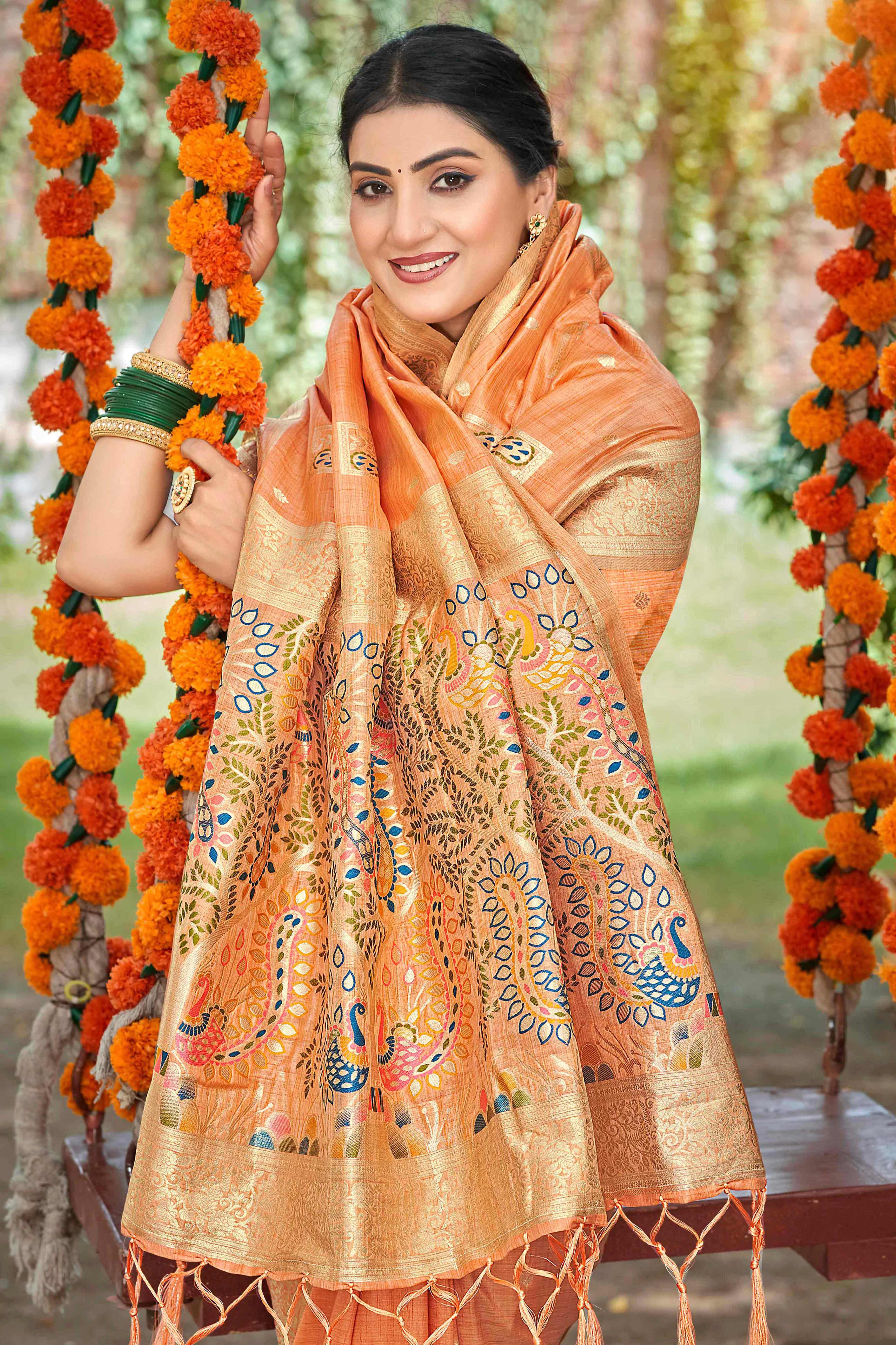 Orange Floral & Peacock Motif Zari Woven Assam Silk Blend Saree With Graceful Tassel Pallu