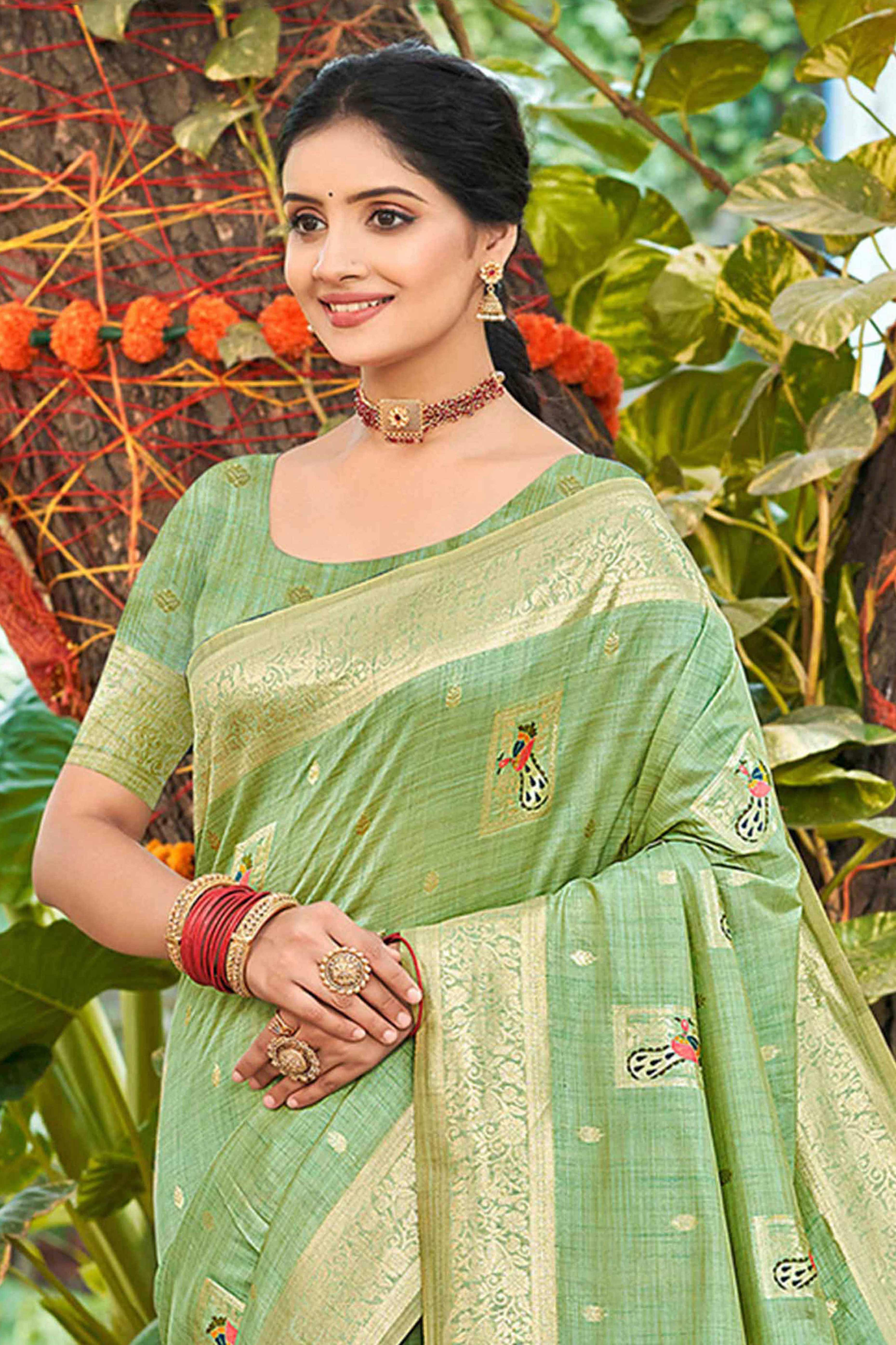 Sea Green Floral & Peacock Motif Zari Woven Assam Silk Blend Saree With Graceful Tassel Pallu