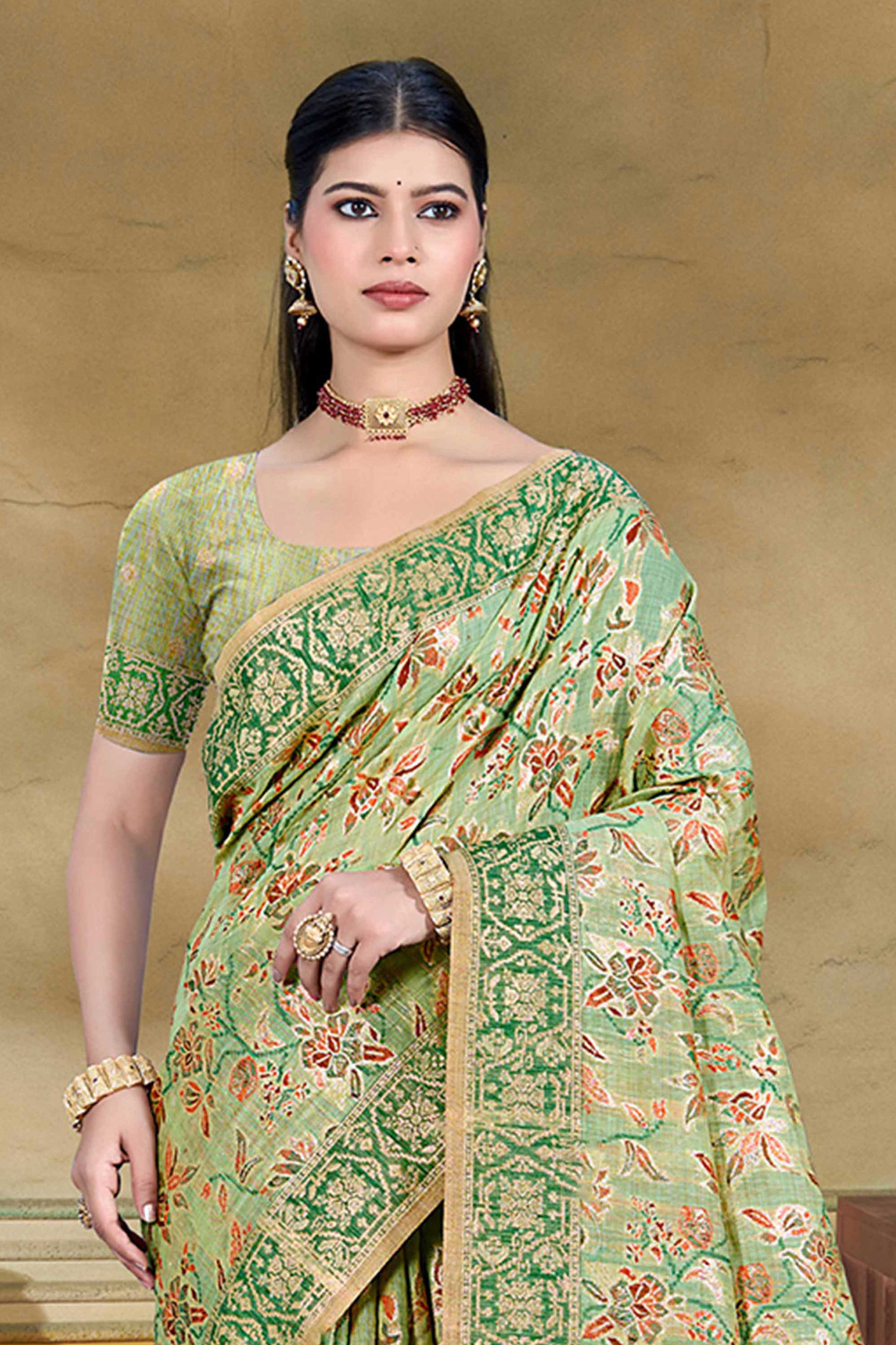 Alluring Green Floral Zari Weaving Cotton Silk Saree With Graceful Tassel Pallu