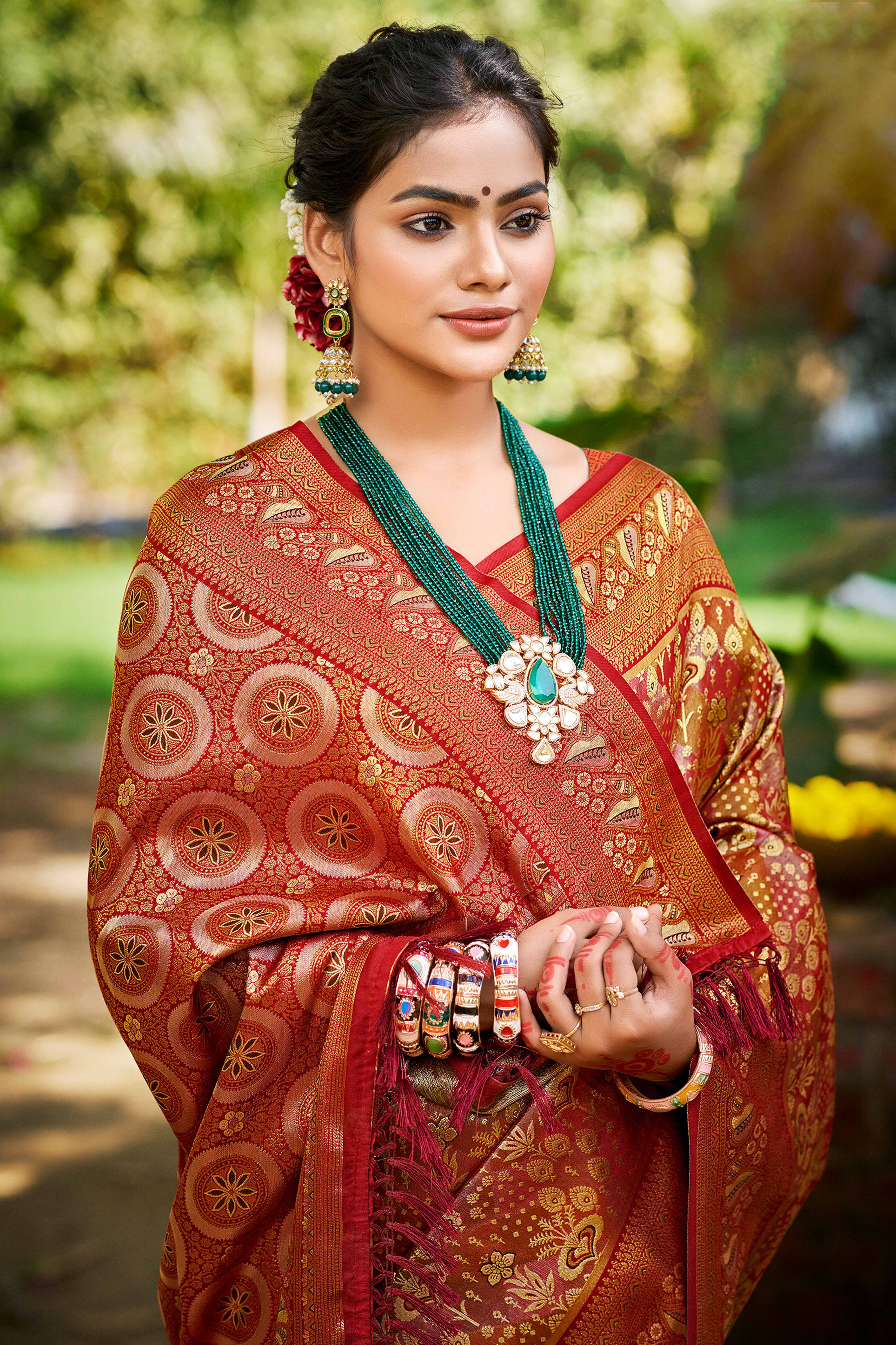 Maroon Floral Weaving Silk Blend Dharmavaram Saree Accented With Tassel Pallu