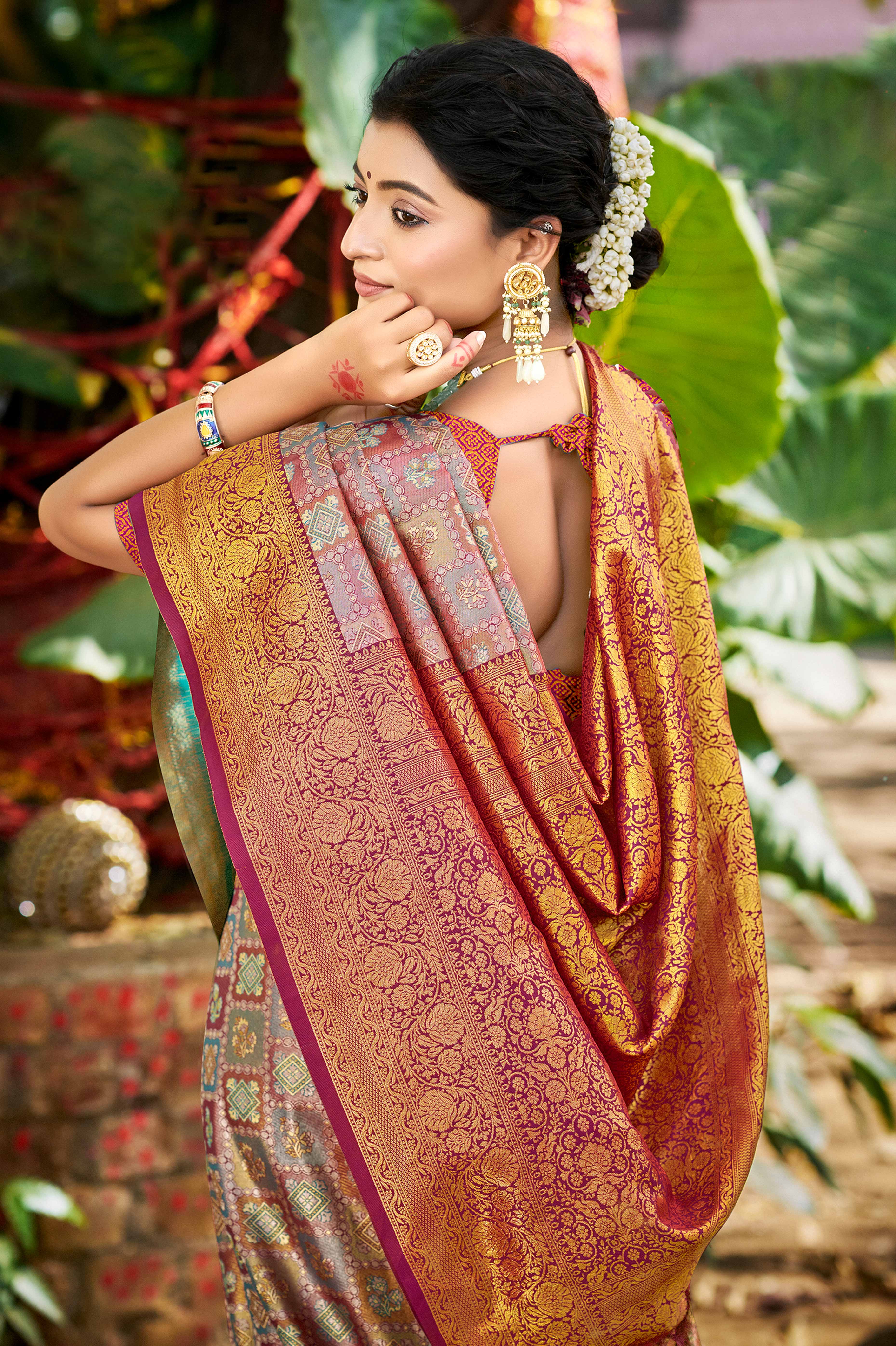 Purple Silk Blend Dharmavaram Saree Featuring Ornate Floral Weaves & Tassels Pallu