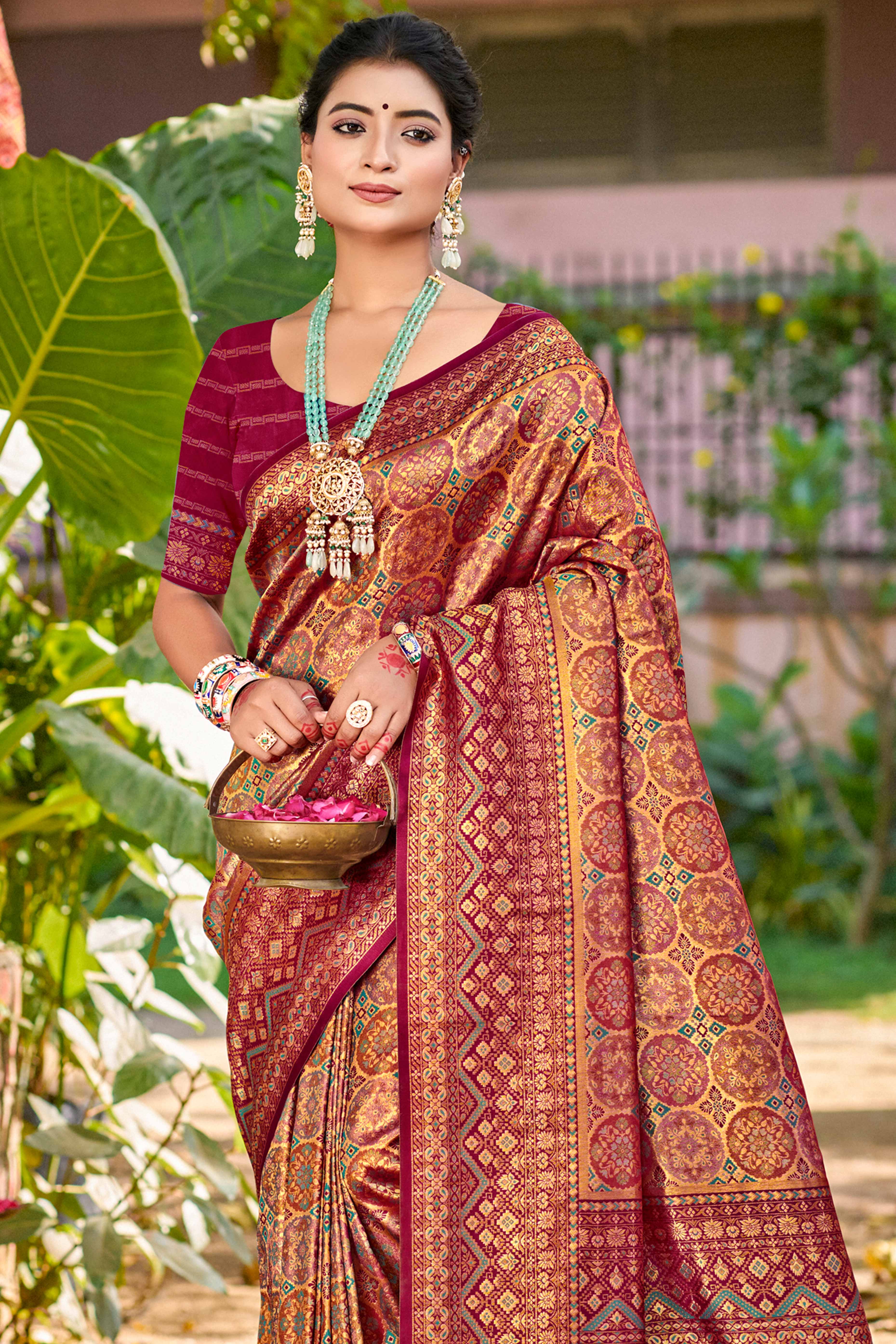 Floral Patterned Wine Woven Silk Blend Dharmavaram Saree With Tassel Elegance