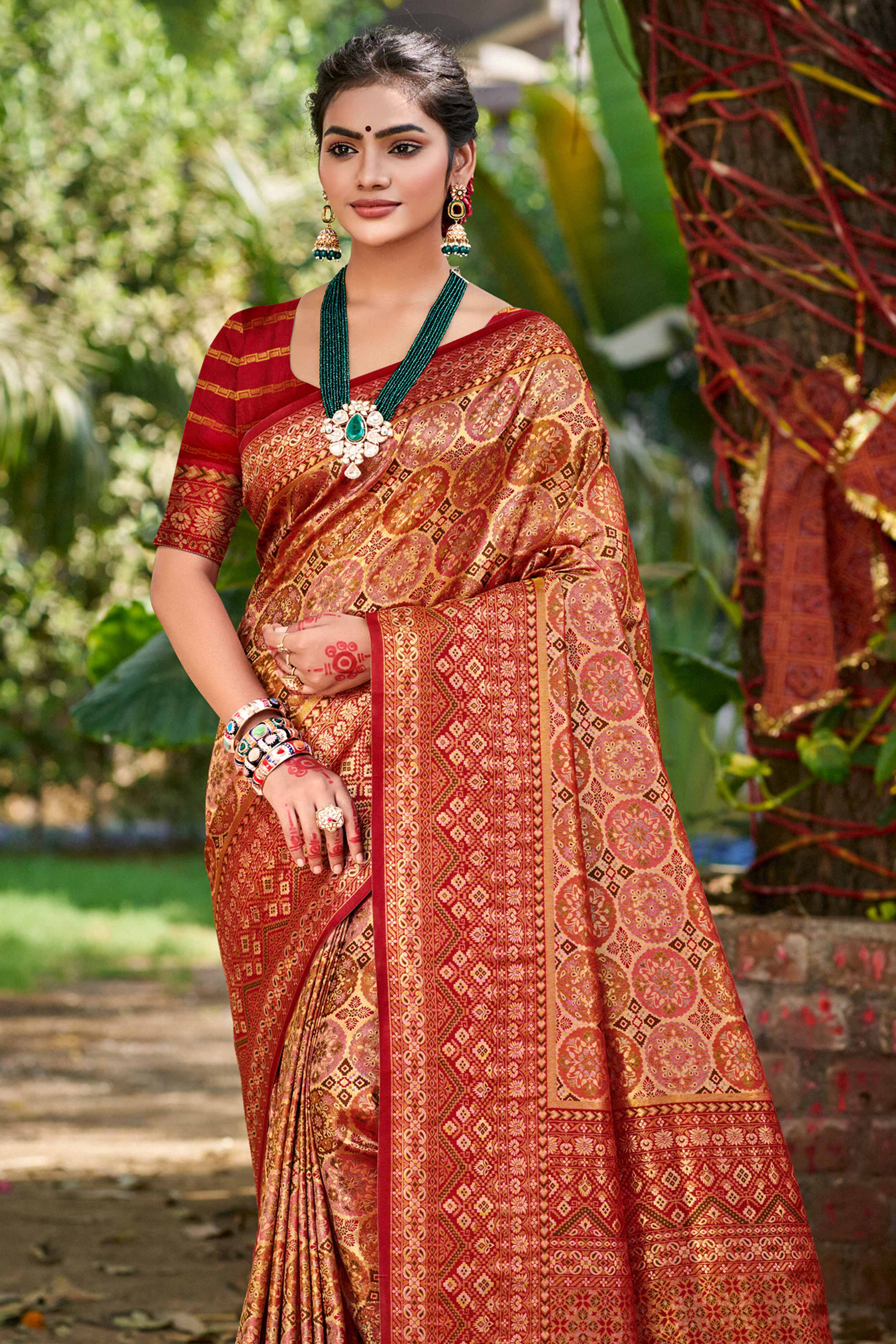 Floral Patterned Maroon Woven Silk Blend Dharmavaram Saree With Tassel Elegance