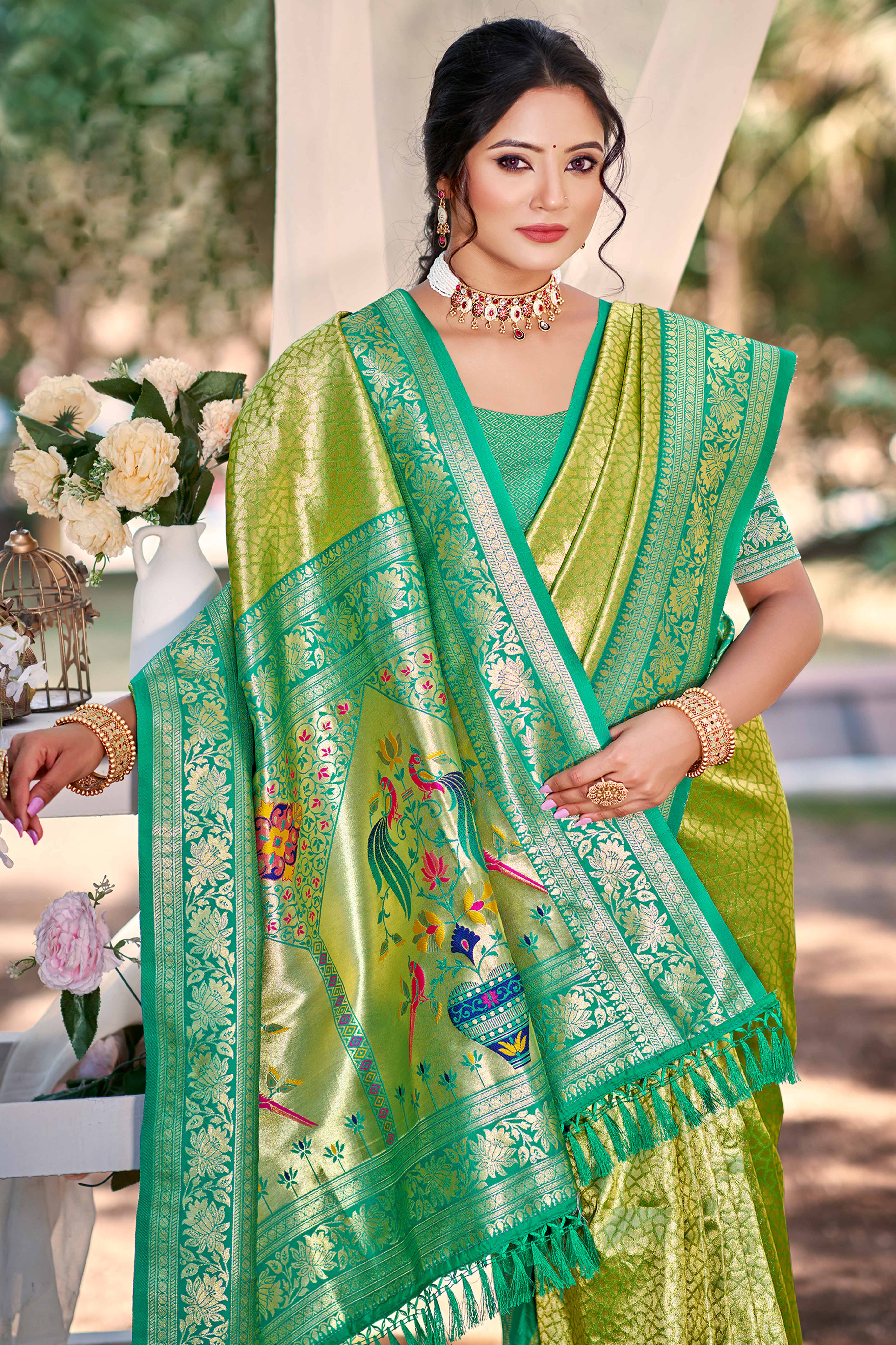 Green Kanjivaram Silk Paithani Saree With Elegant Floral Weaving & Tassel Pallu