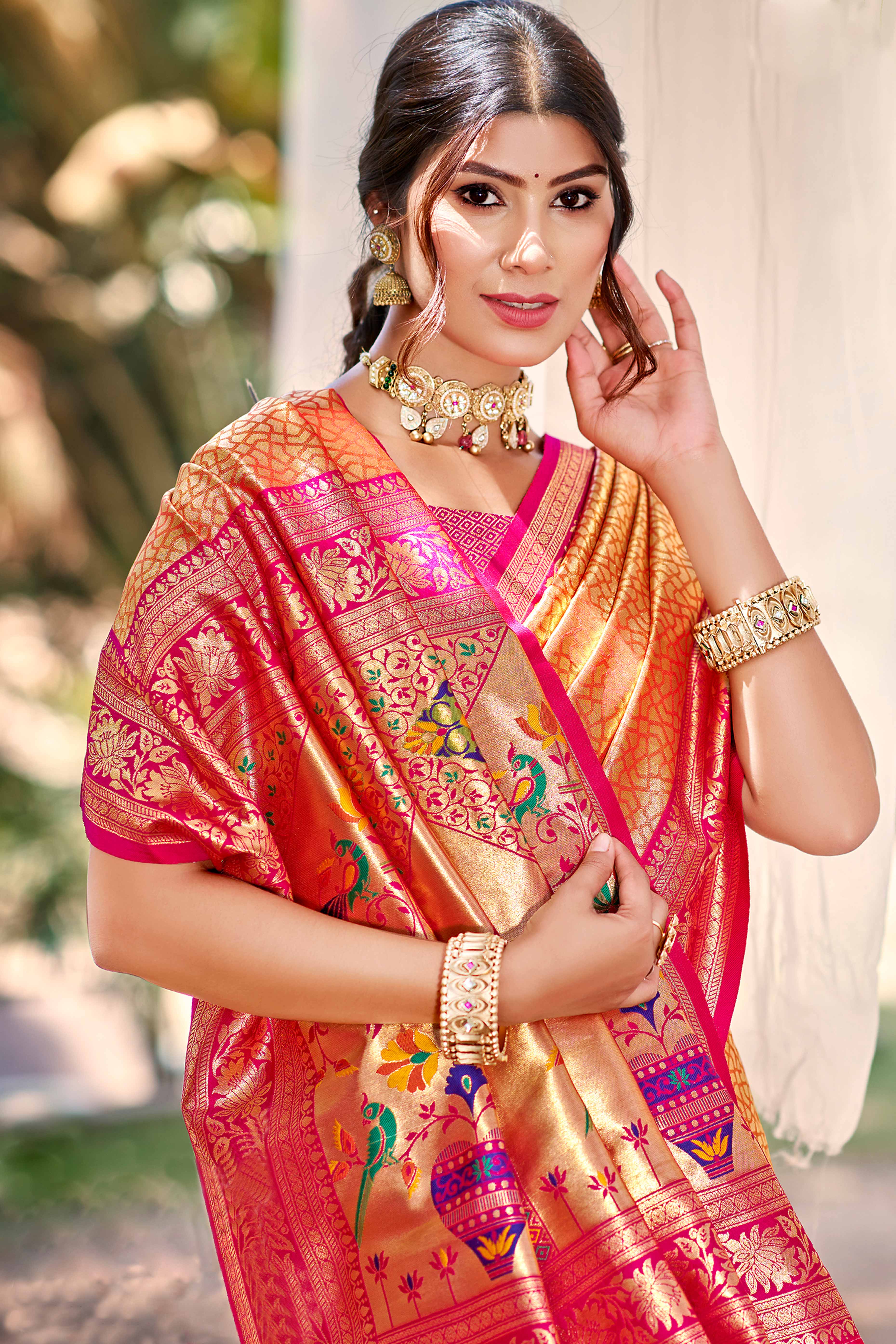 Orange Kanjivaram Silk Paithani Saree With Elegant Floral Weaving & Tassel Pallu